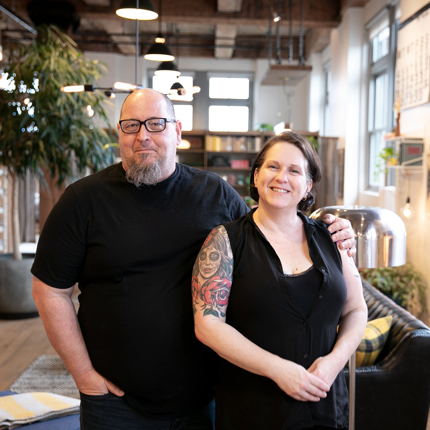 man and woman posing for a picture