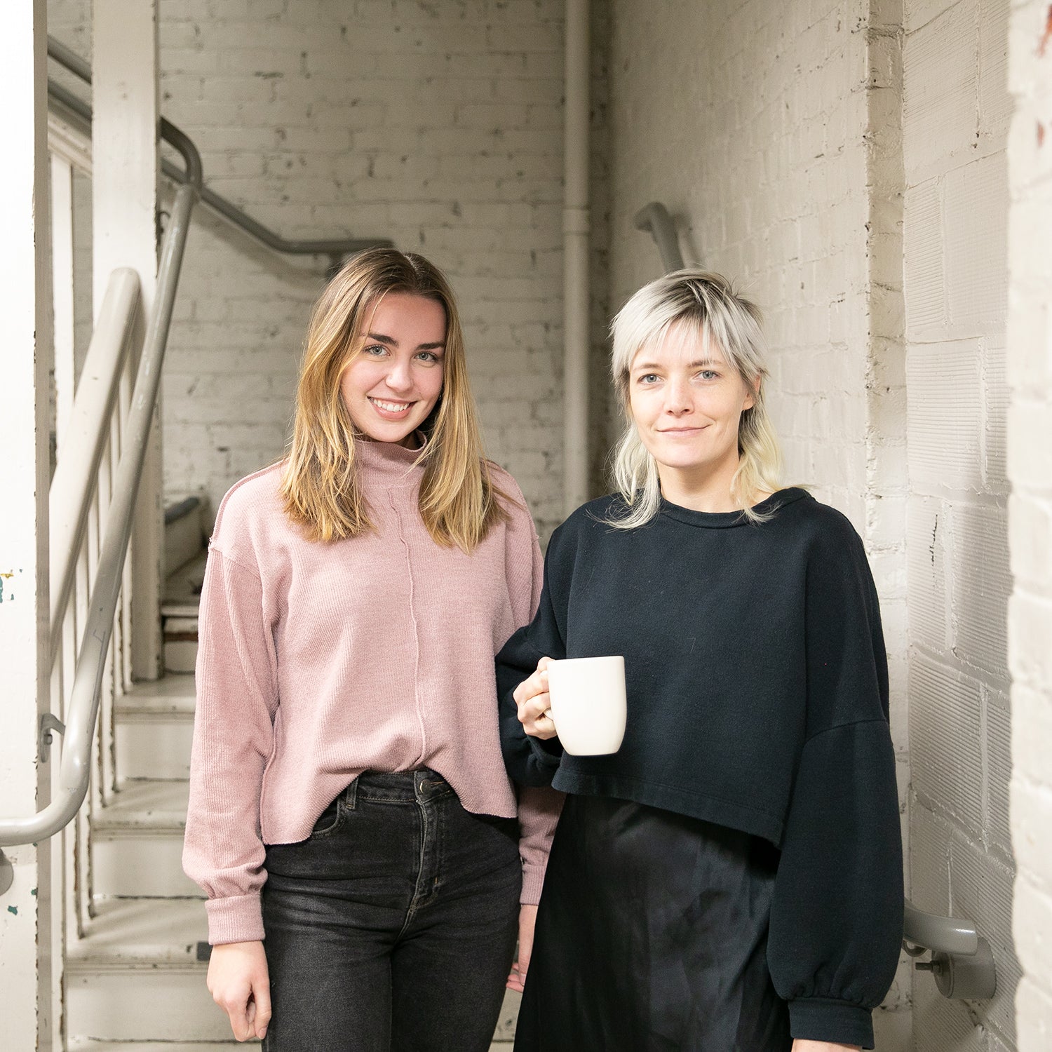 two women standing next to each other