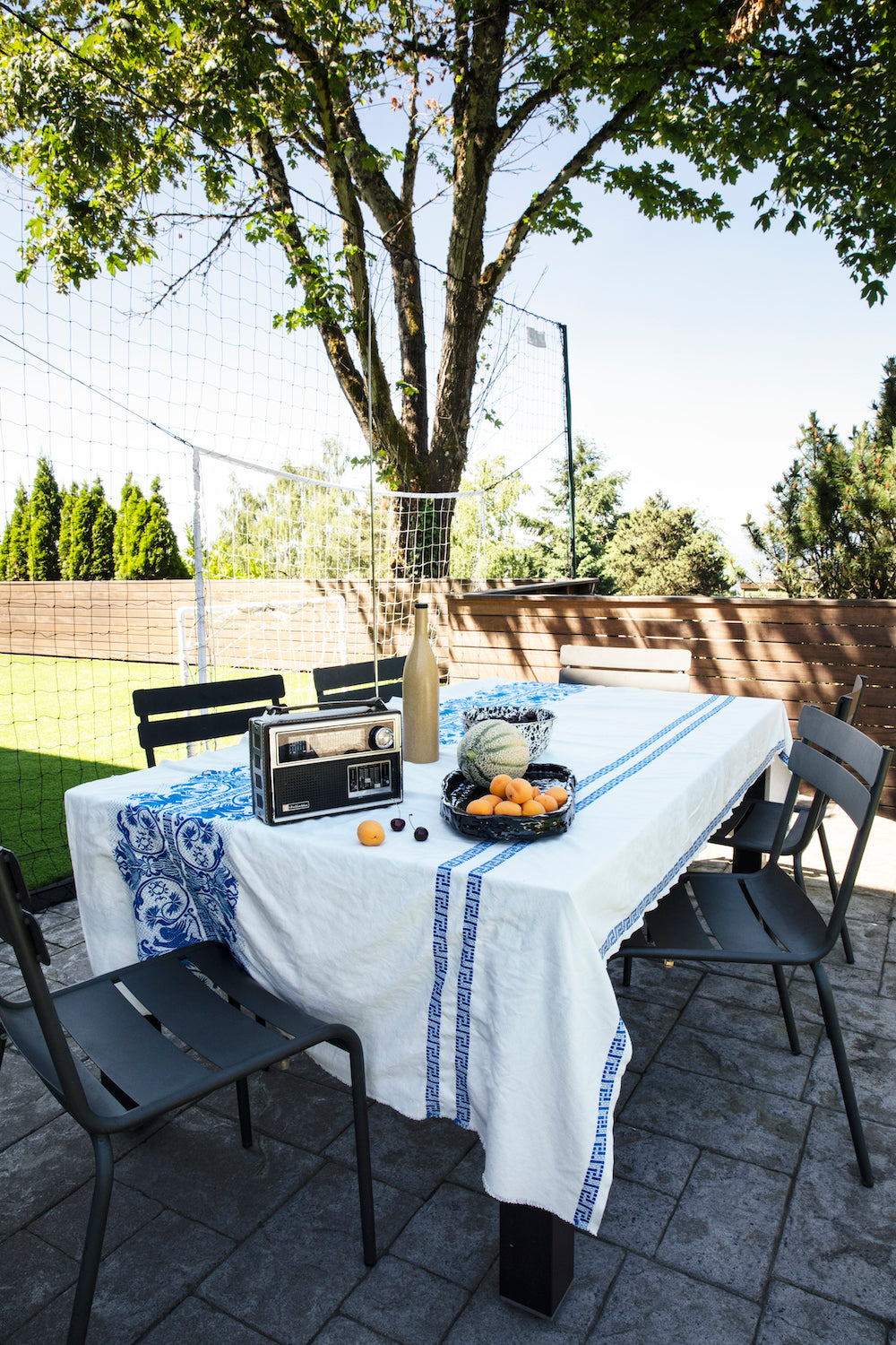 picnic table with tablecloth outdoors