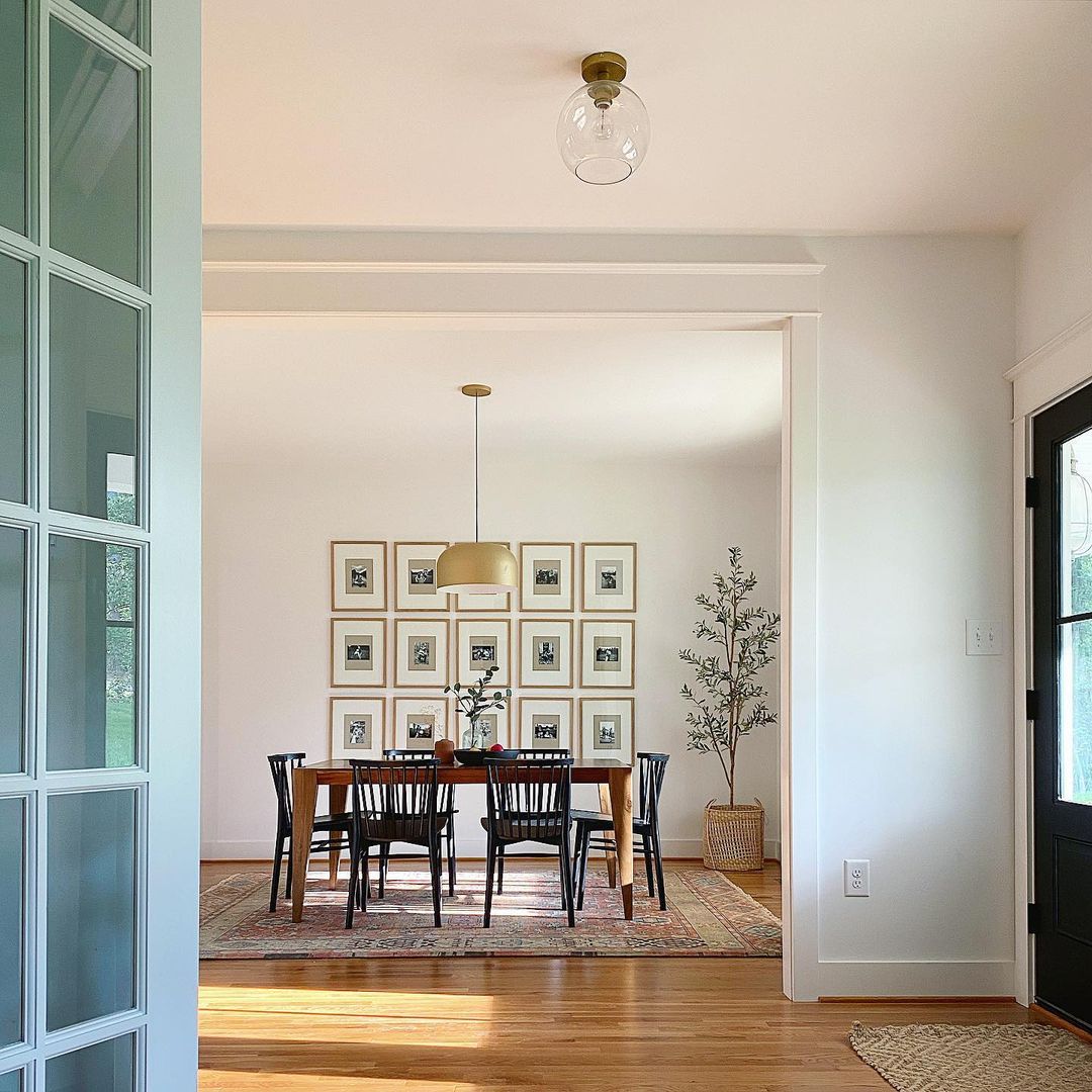 dining room with a table and chairs and a rug