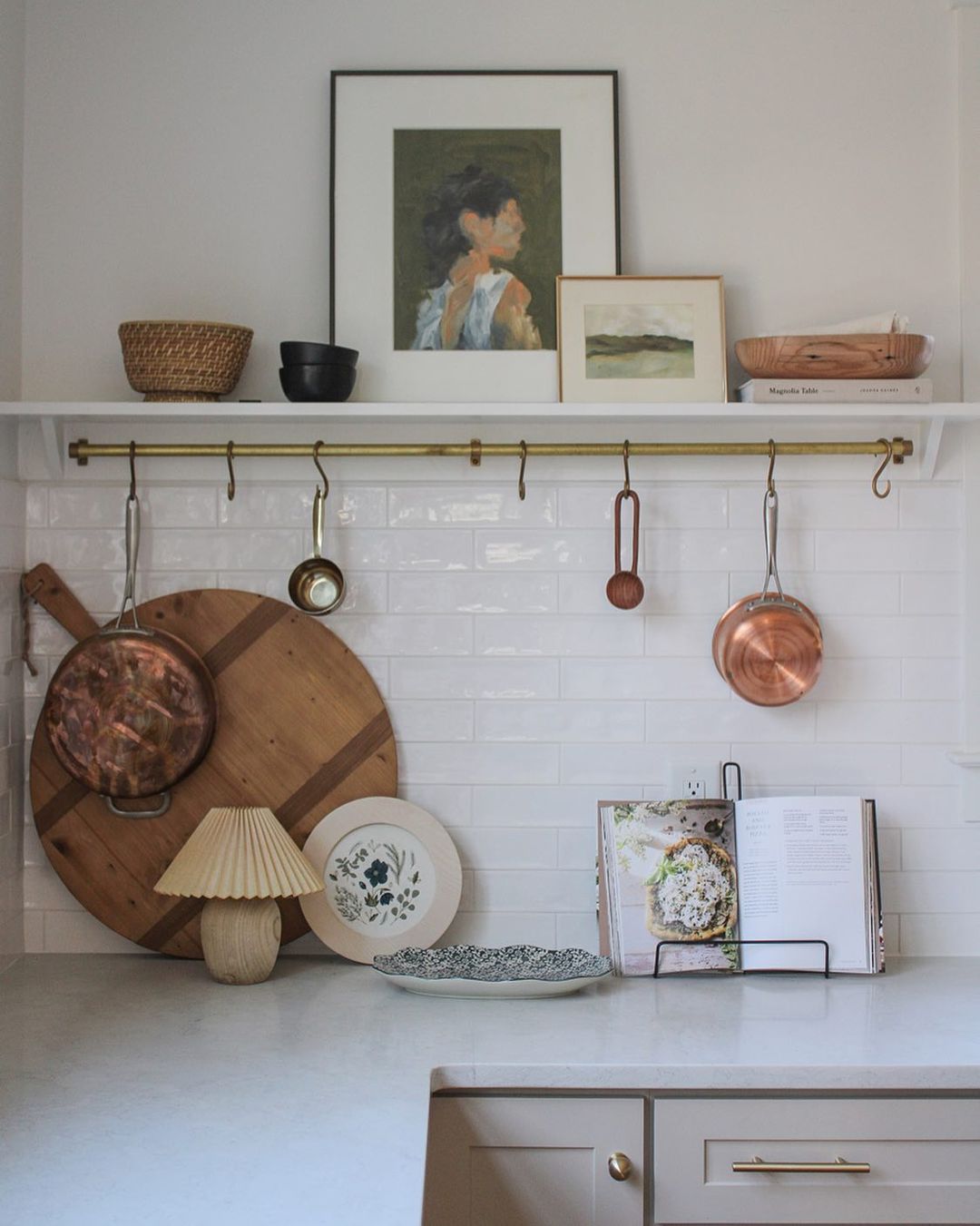 kitchen with a shelf with objects on it
