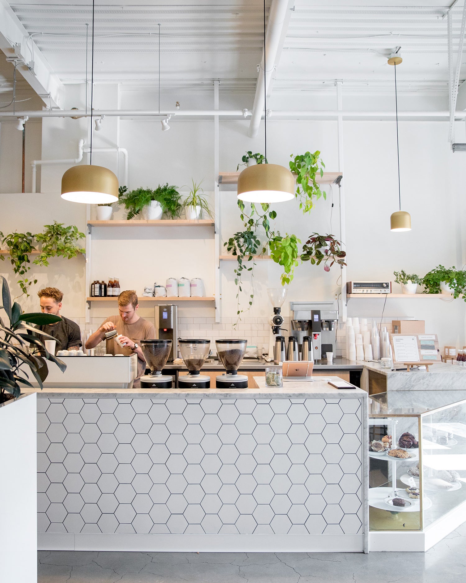 kitchen with a few people