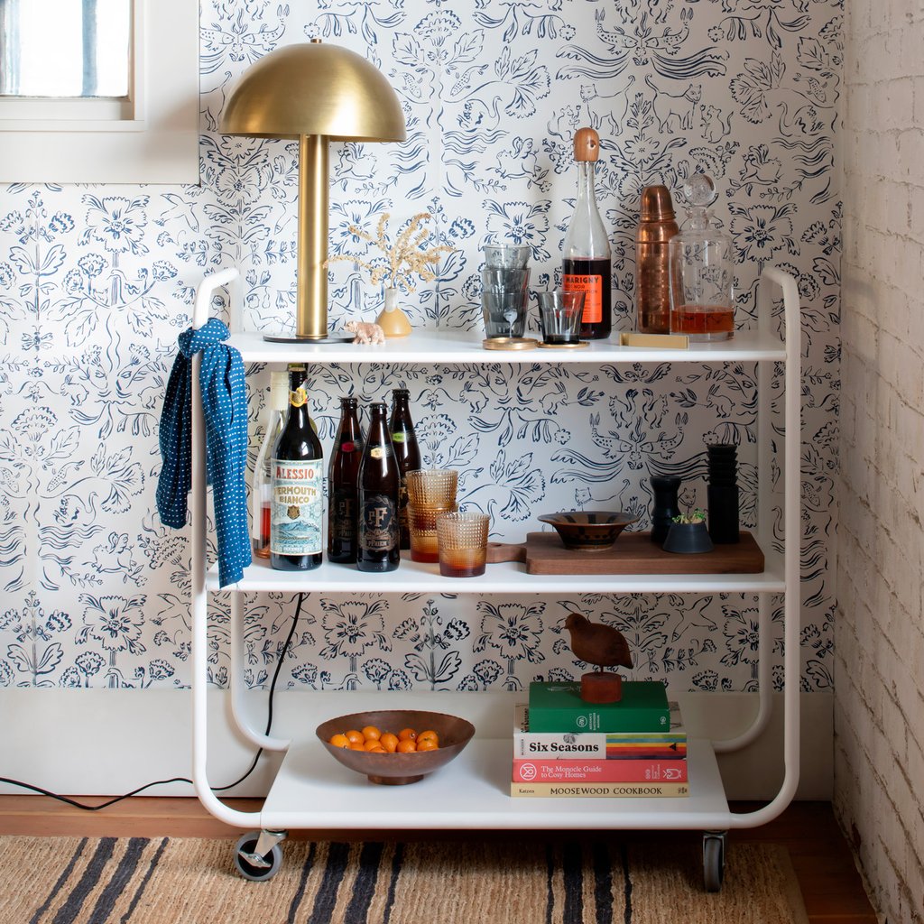 shelves with gold lamp