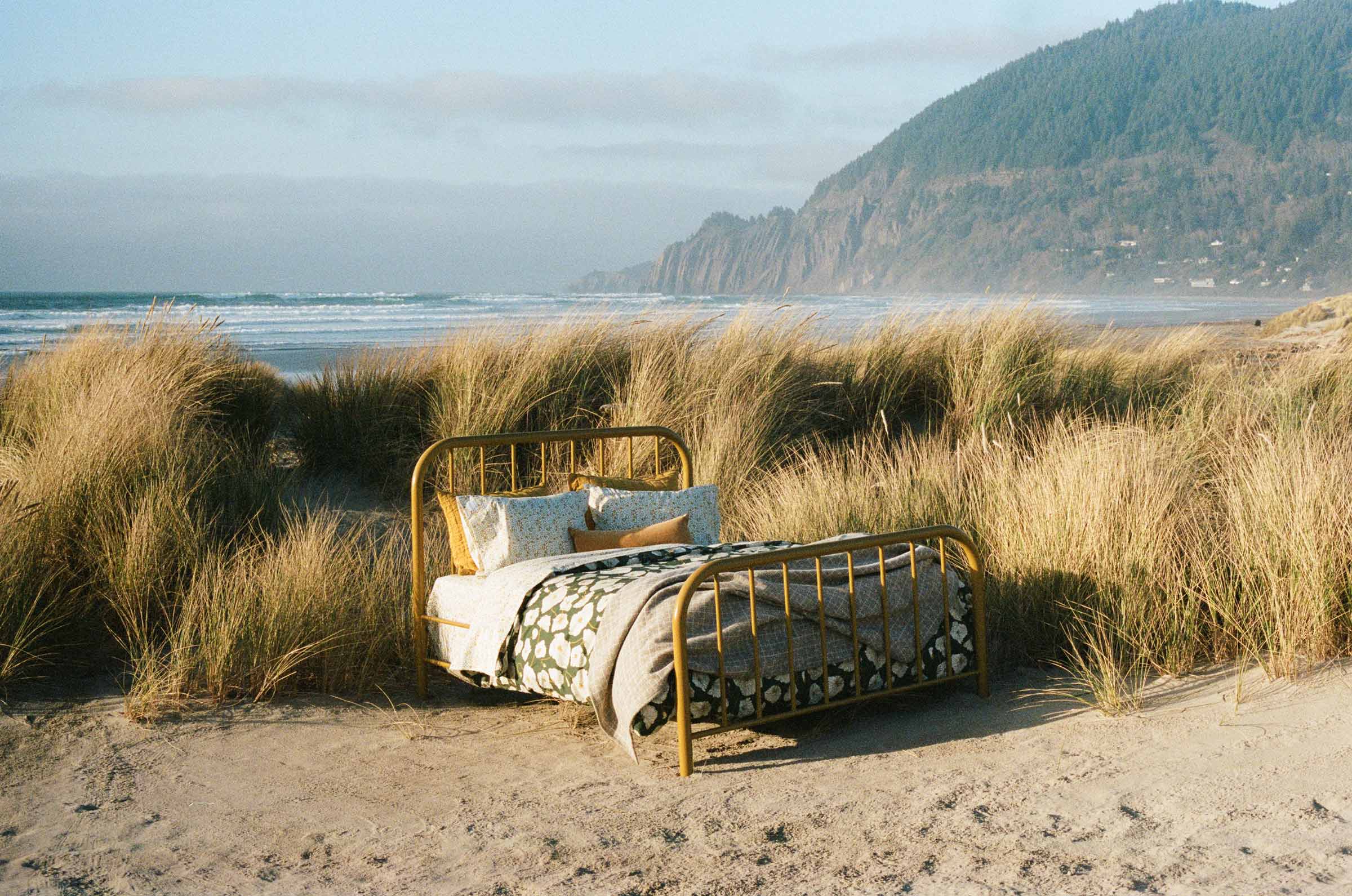 The Hamilton Bed by Schoolhouse on the beach styled with floral bedding.