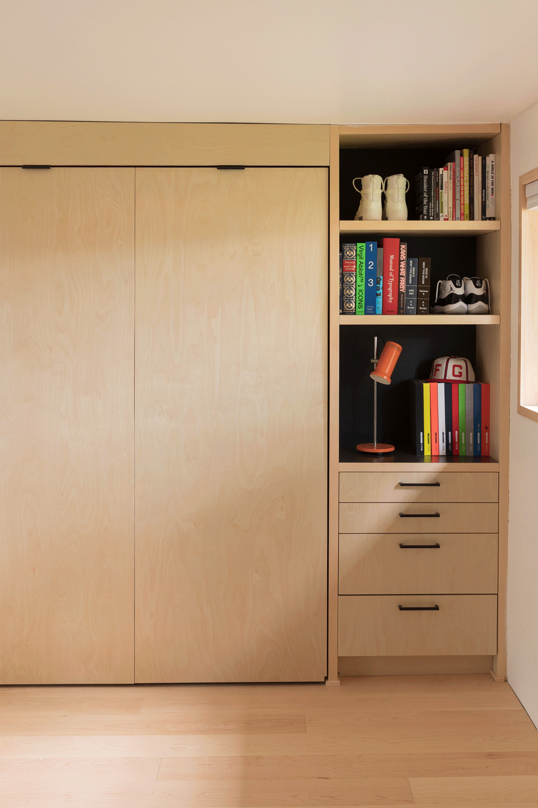 A modern Murphy bed opening and closing. 