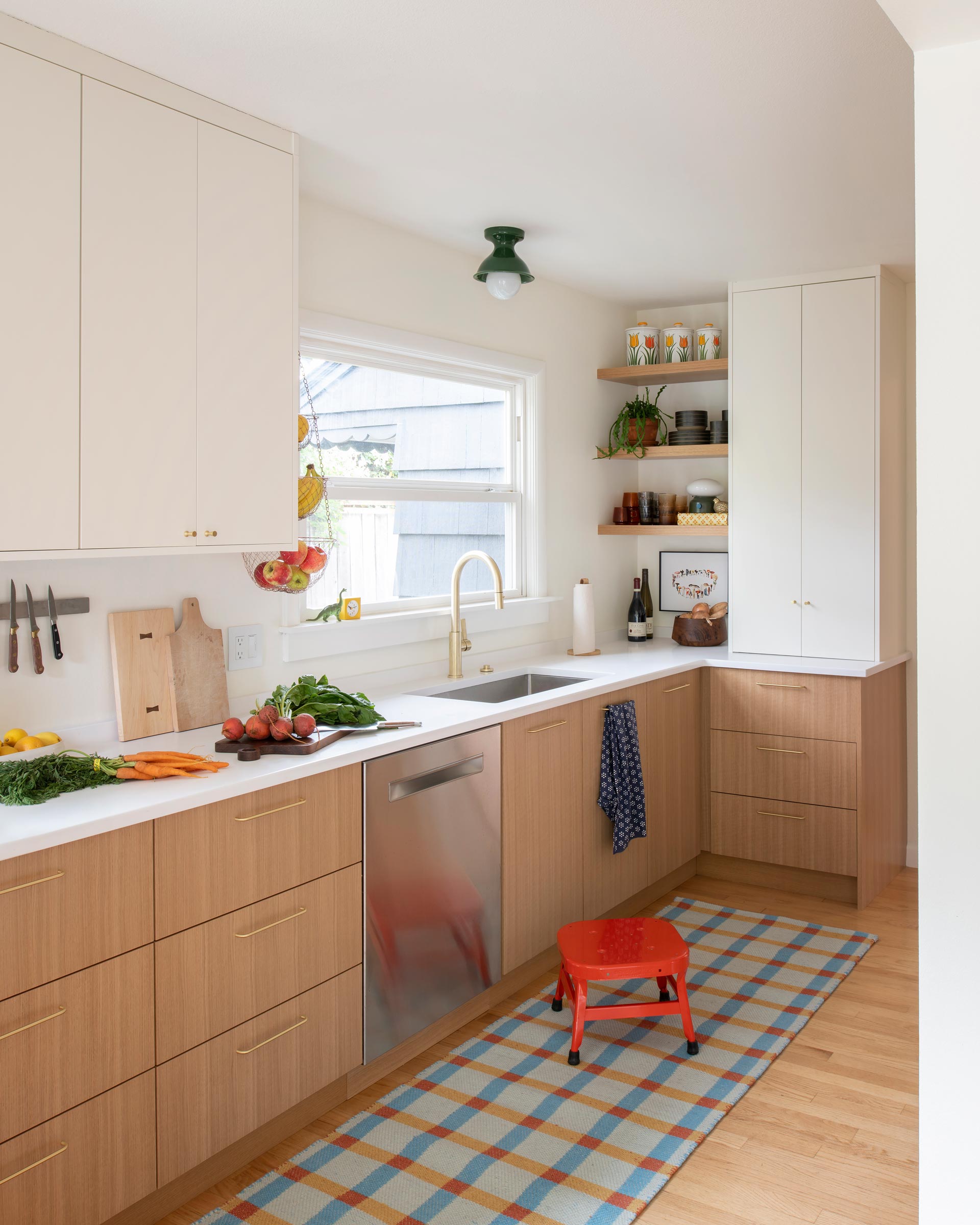 Alabax in Juniper green and brass hardware in a modern kitchen.