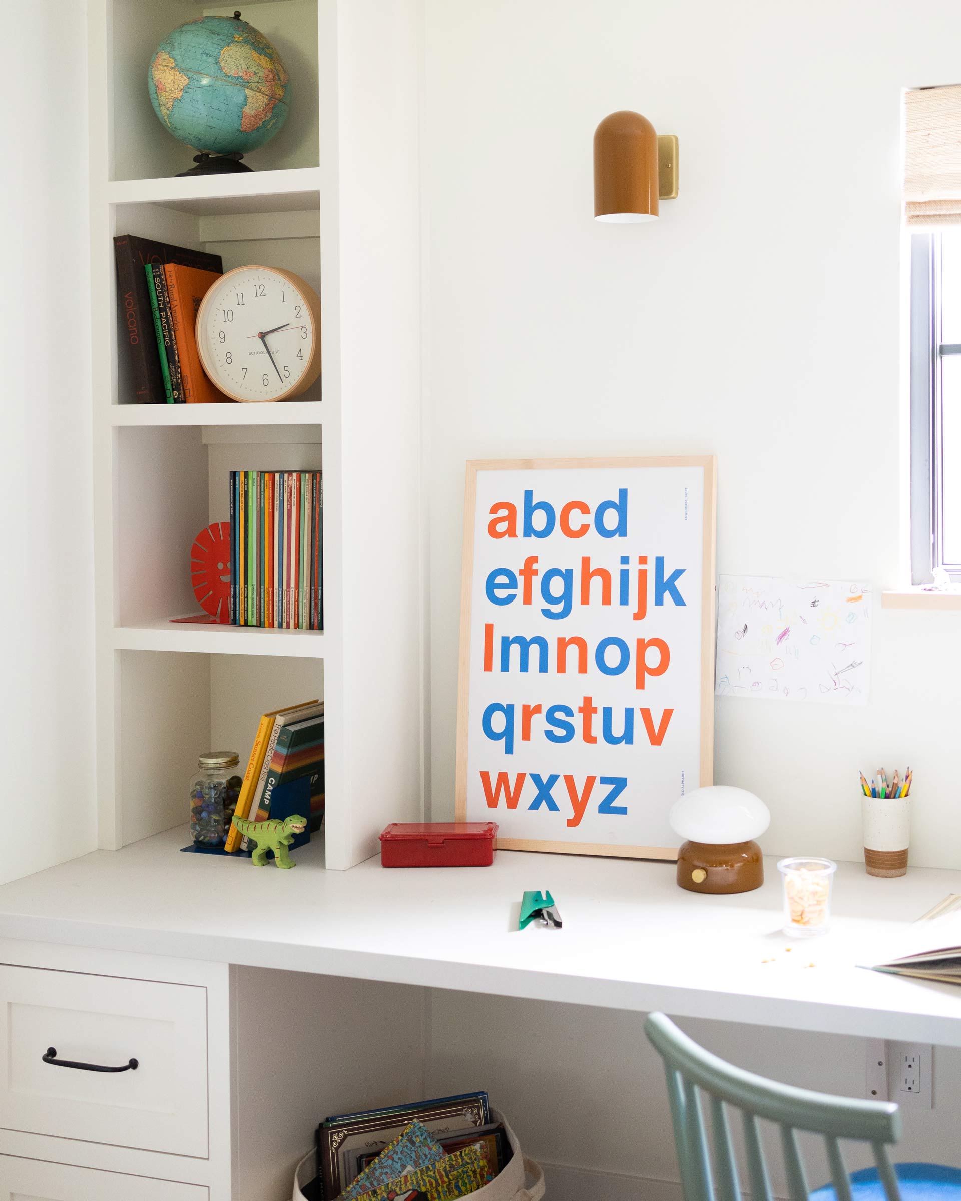 Allegheny wall sconce in butterscotch in a kid's room.