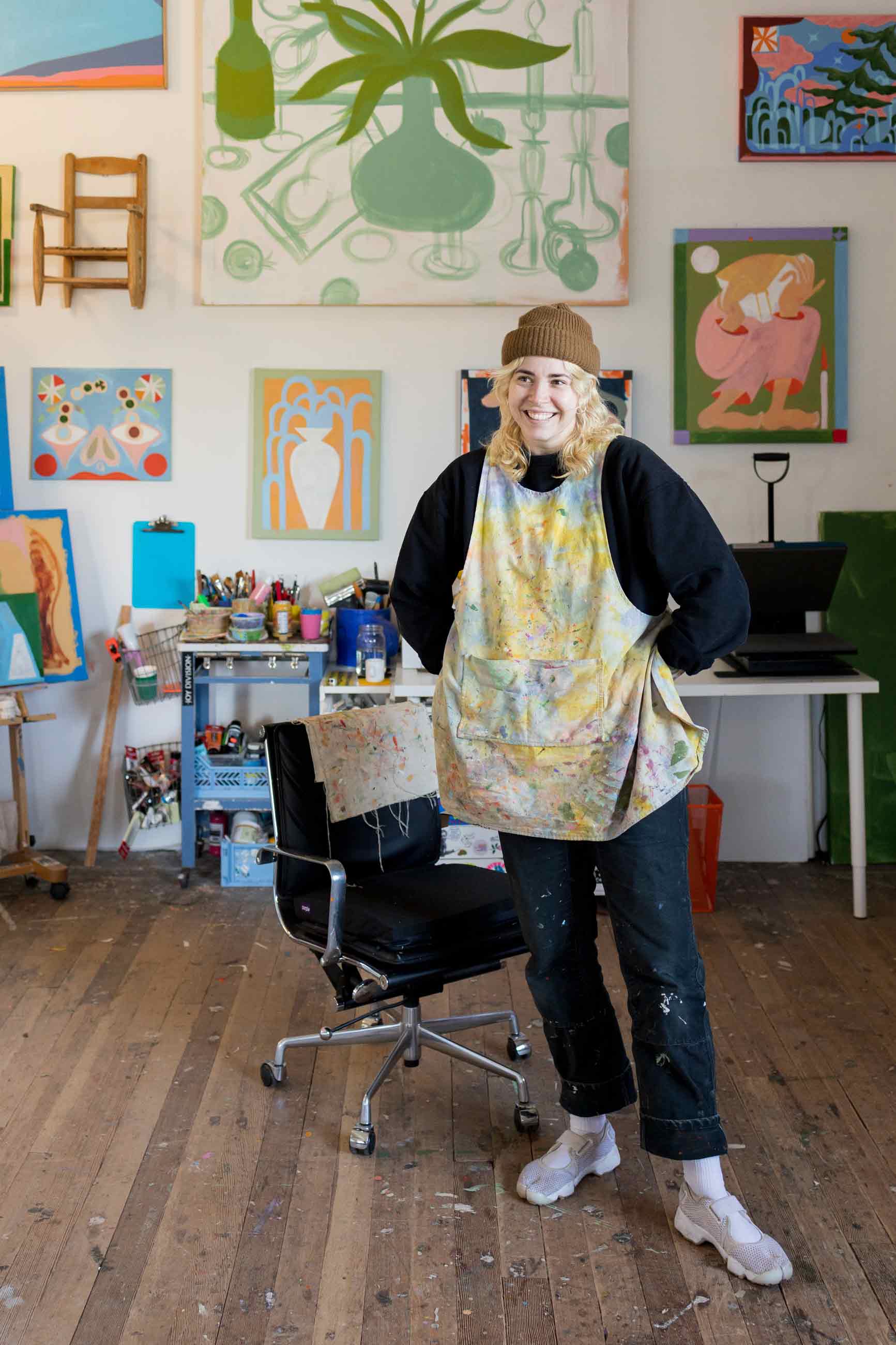 Artist standing in their studio. 