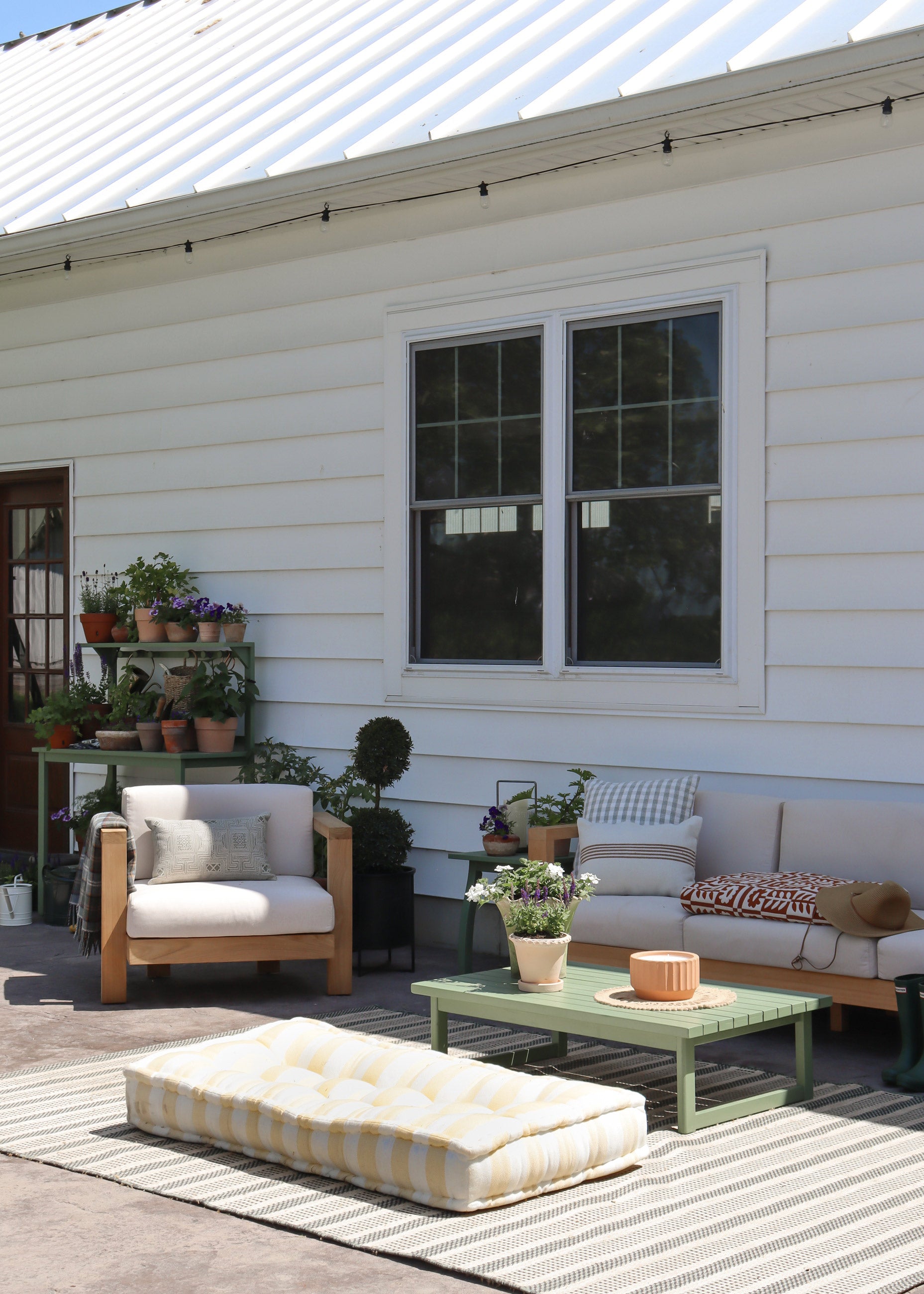 Sunny back porch with ample seating.