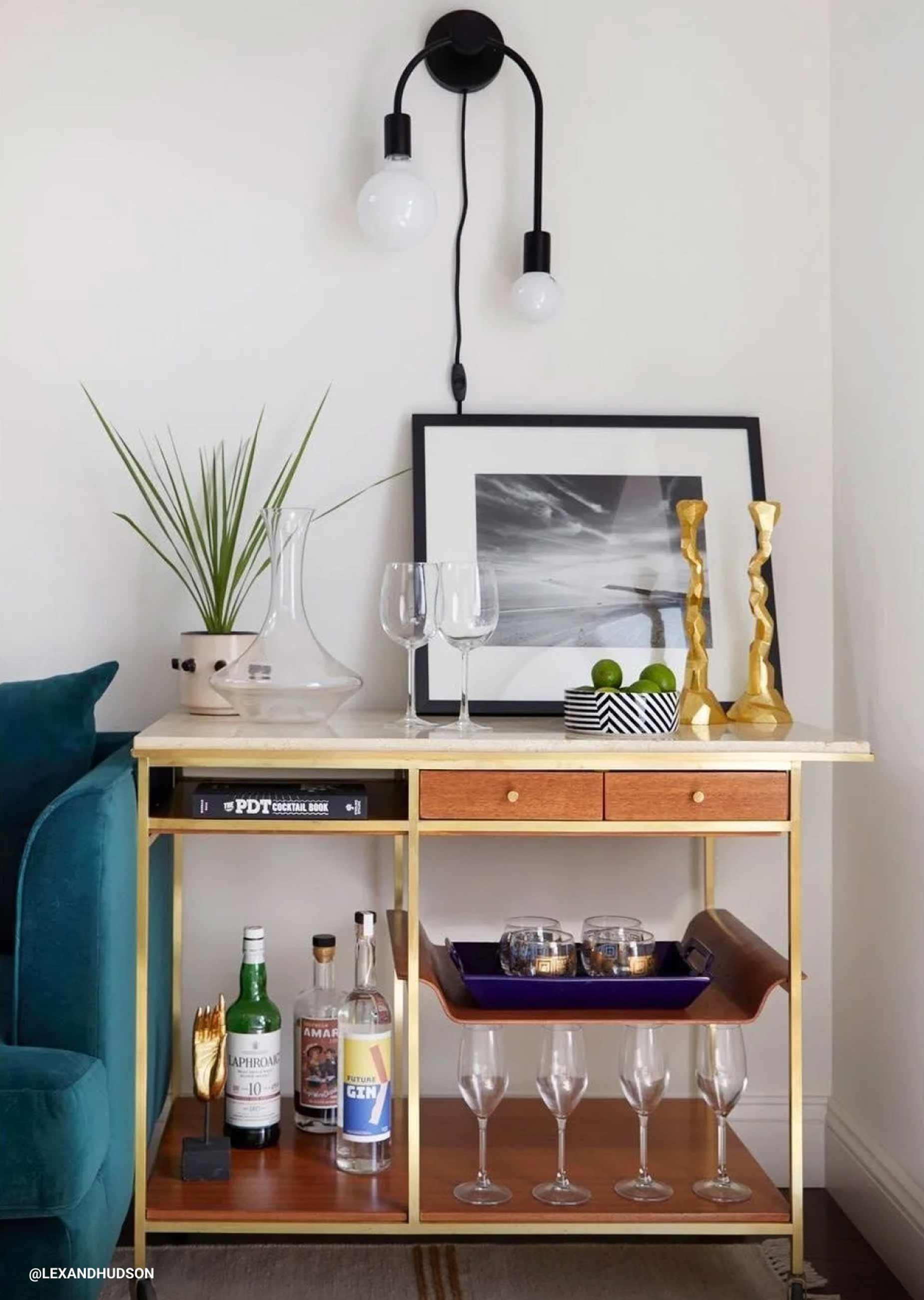 Plug-in sconce above bar cart.