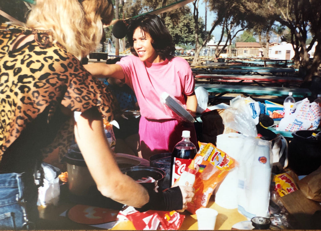 two people interacting outside