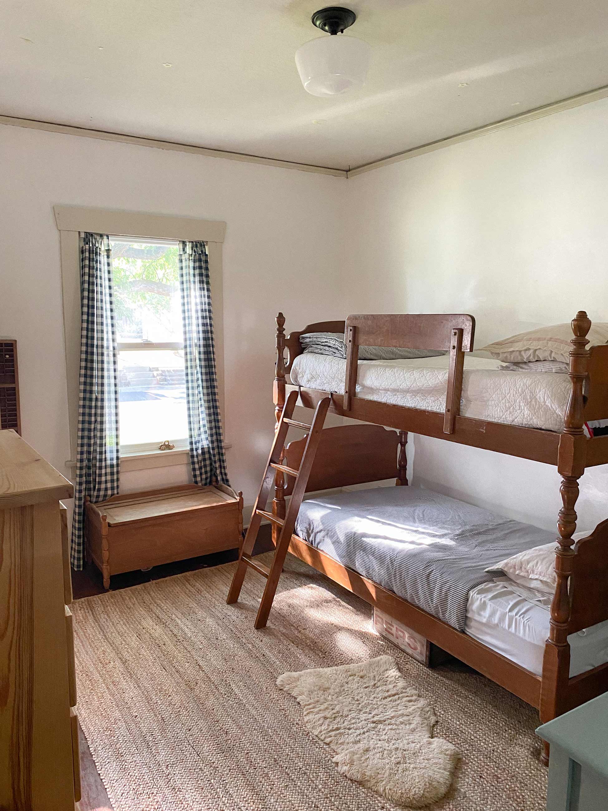 Wooden bunk beds in kids room.