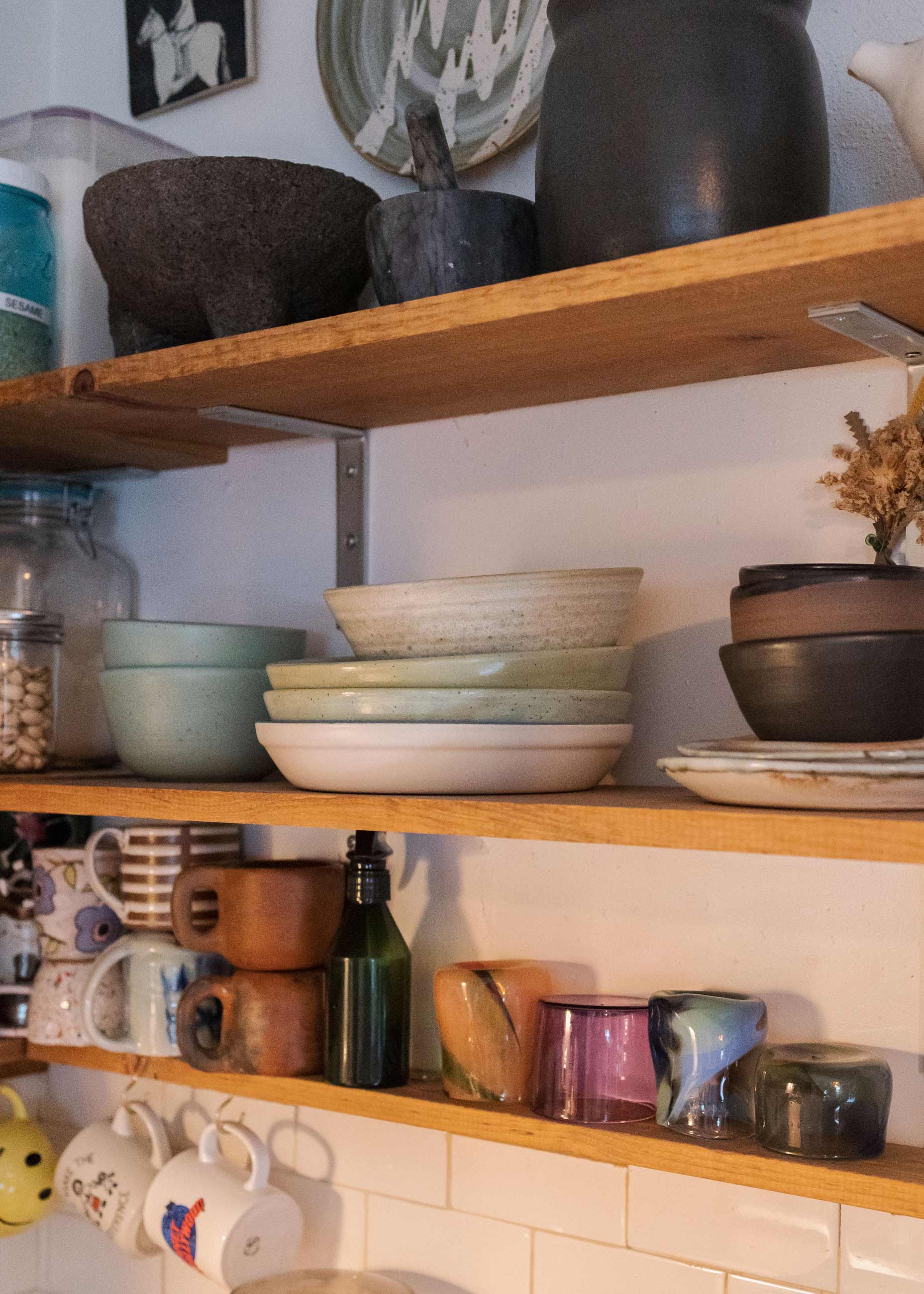 Ceramics on a kitchen shelf.