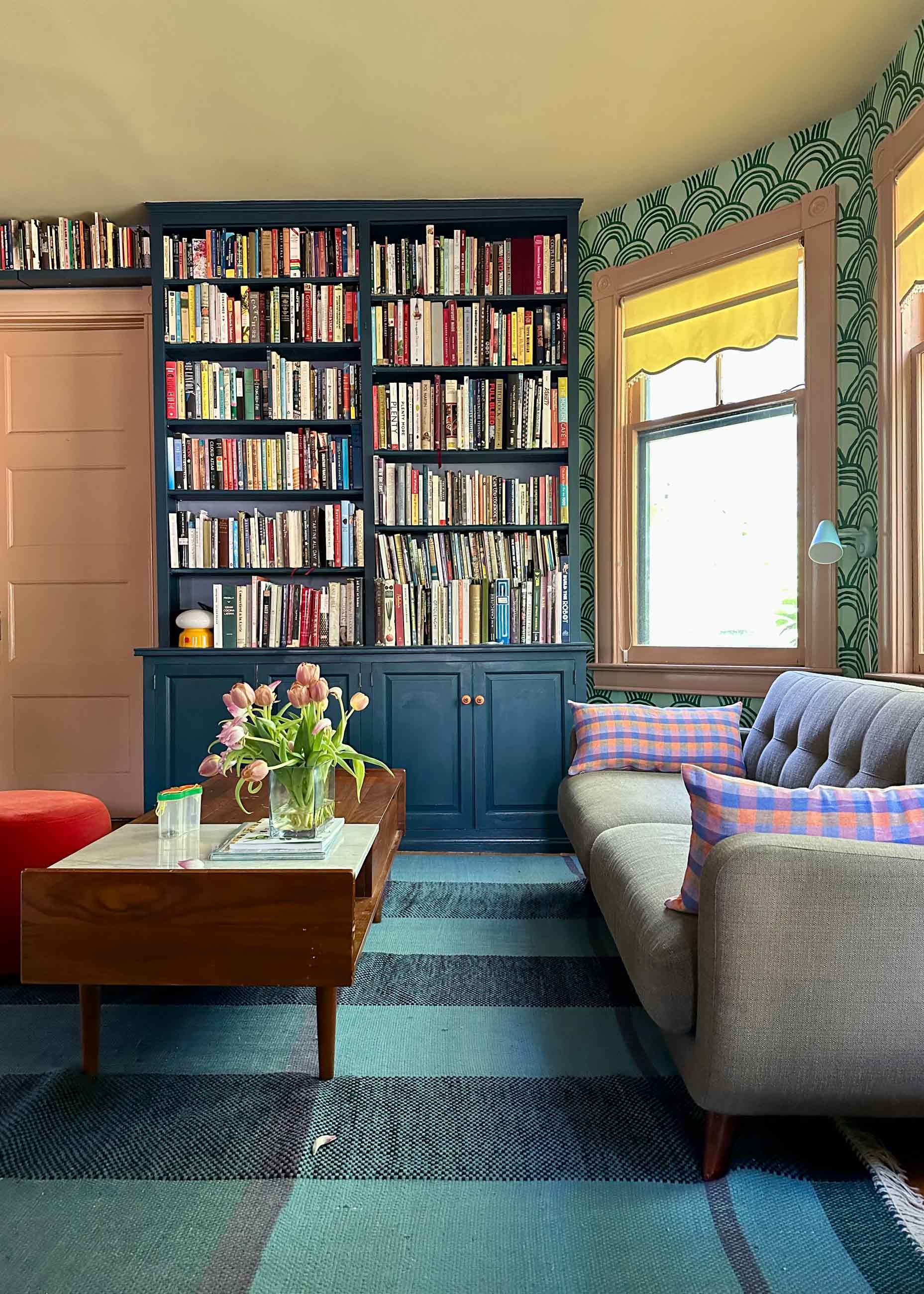 Living room full of brightly painted walls and accent pieces.