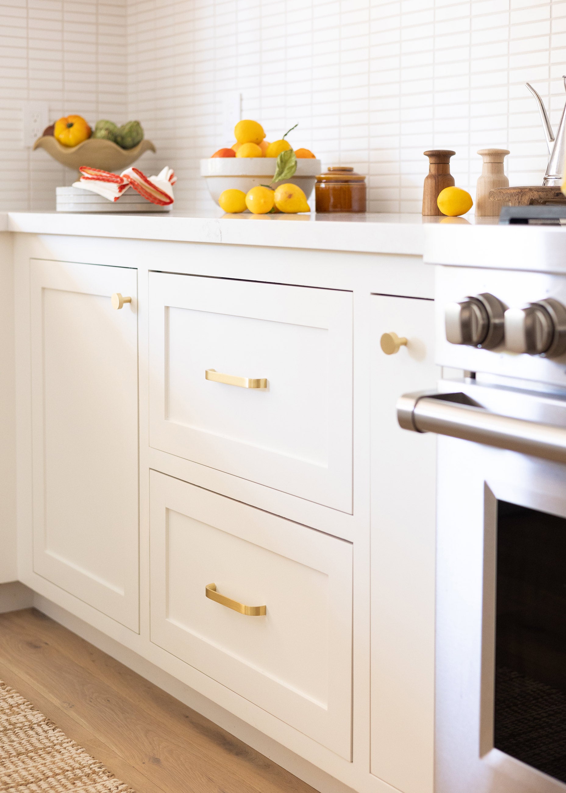 Bright and airy kitchen with white cabinets.