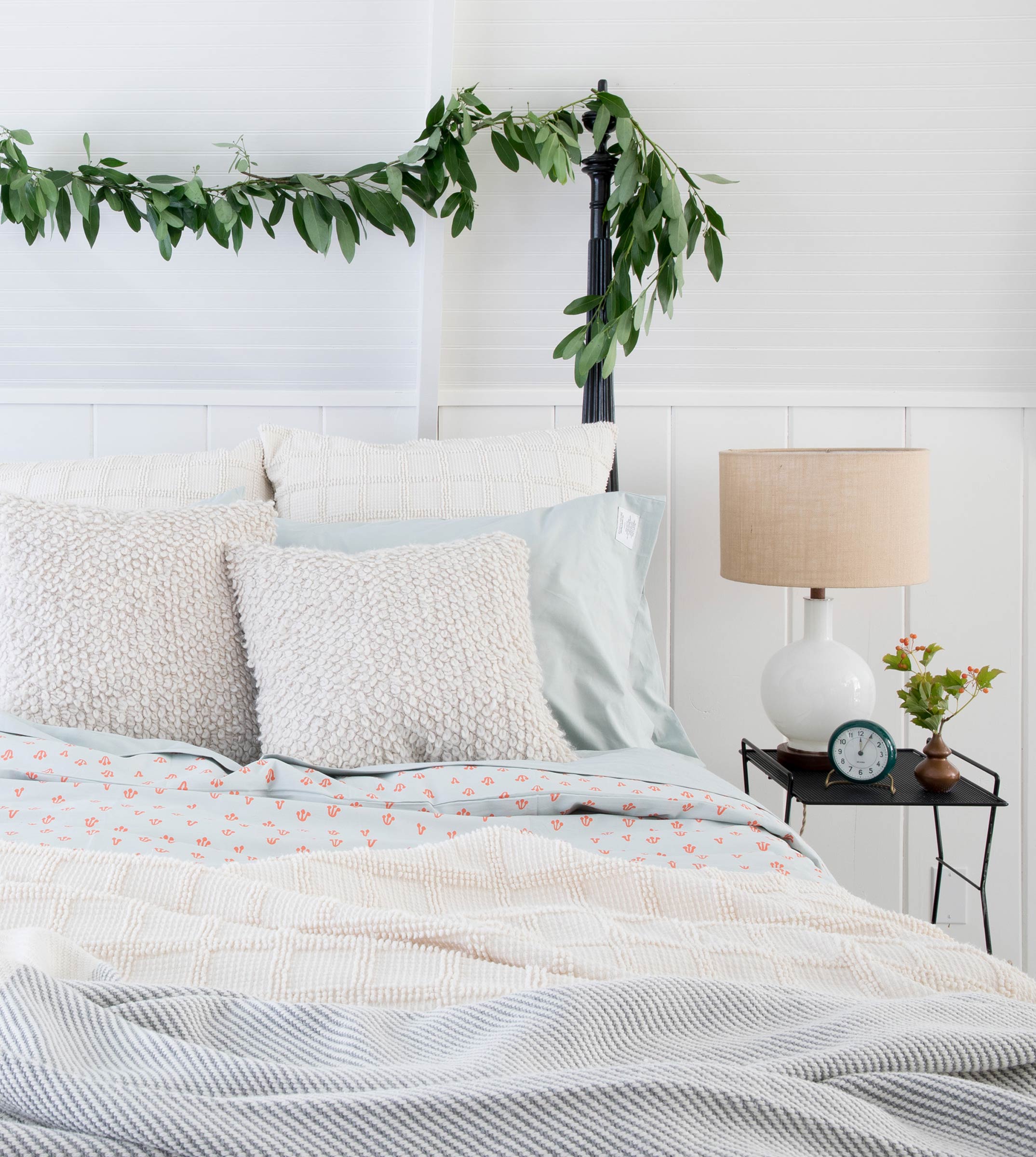 Cozy neutral bedding.