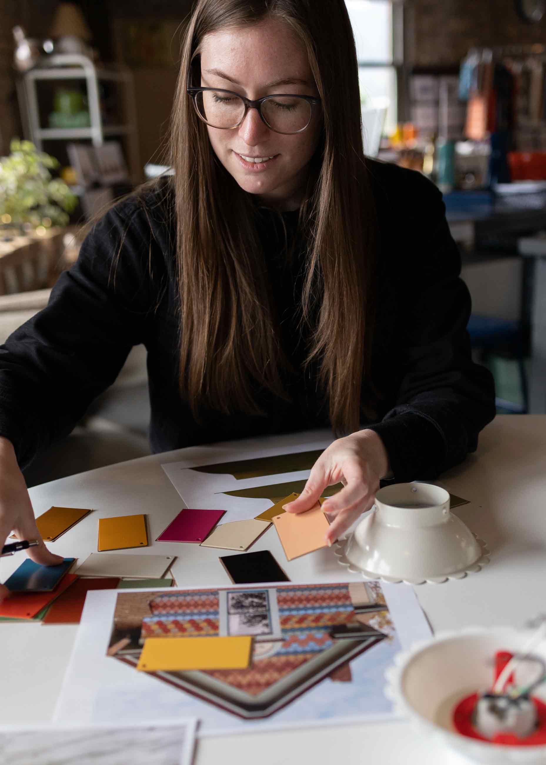 Designer working on a light fixture concept. 