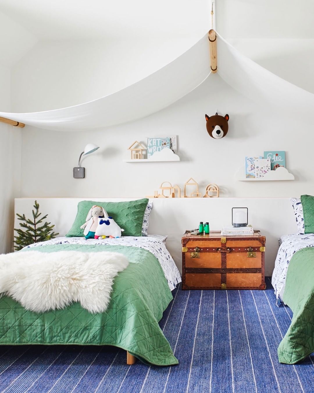 bedroom with two green beds