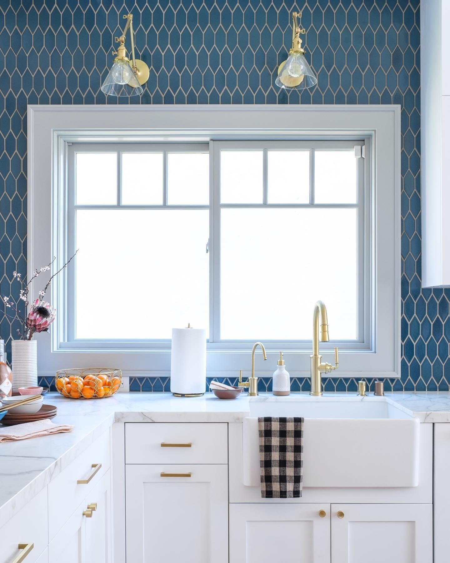 kitchen with a window and white cabinets