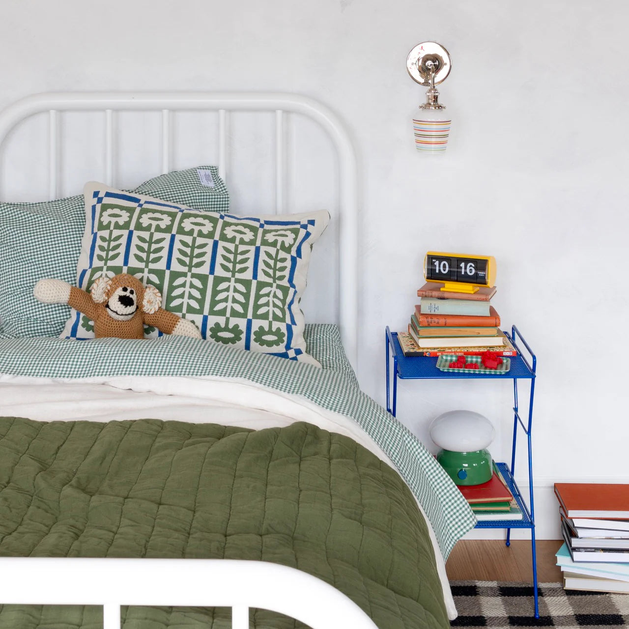 Holiday kid's room with table lamp on side table.