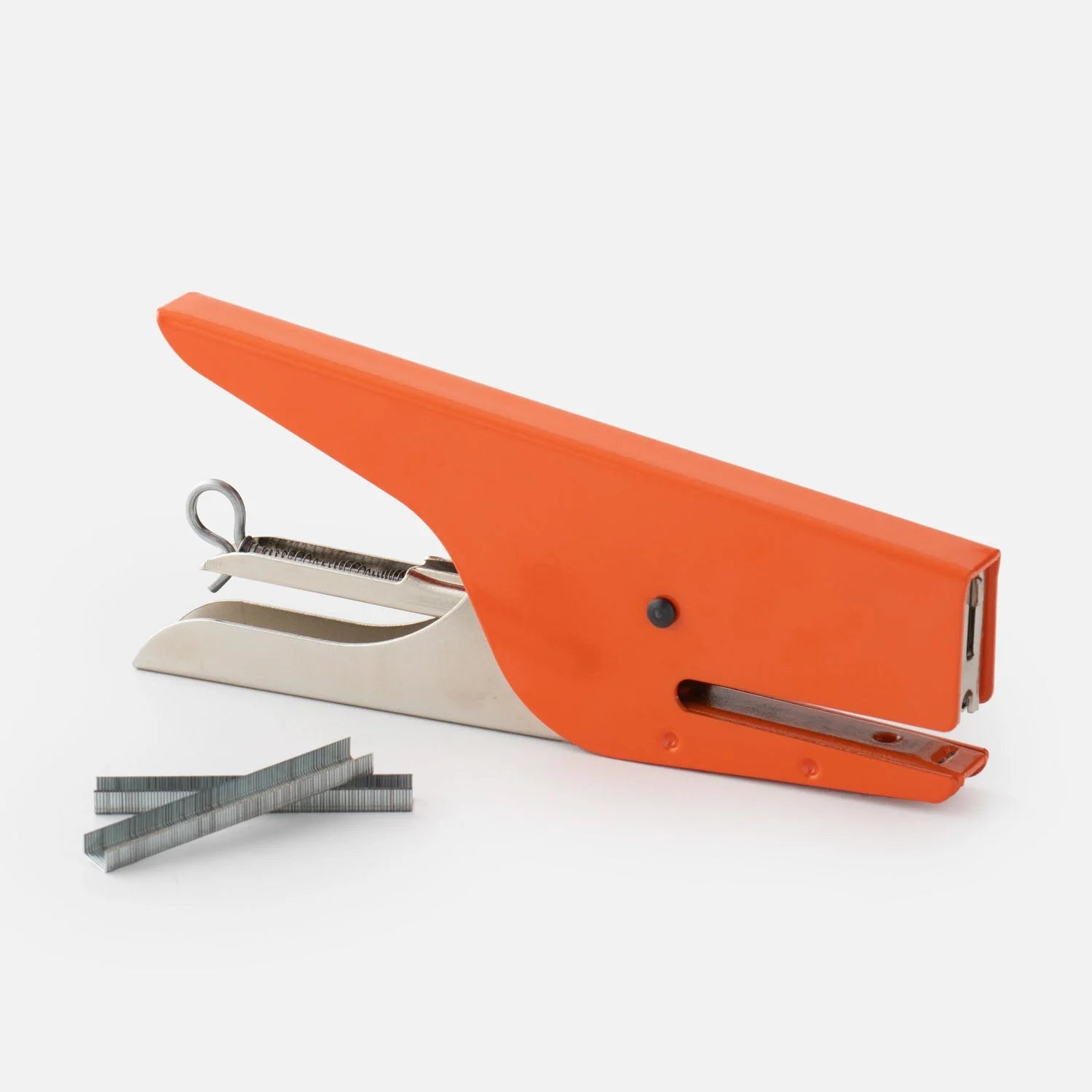 A vibrant orange Italian hand held stapler.