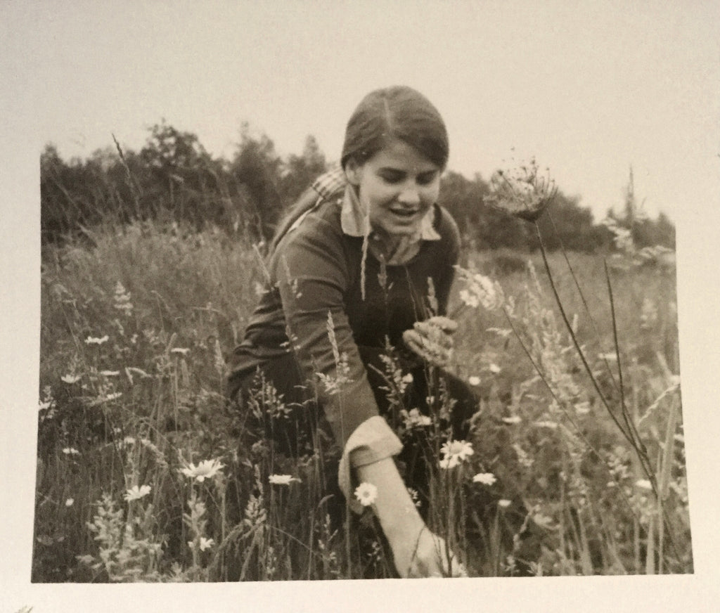 young girl in a field