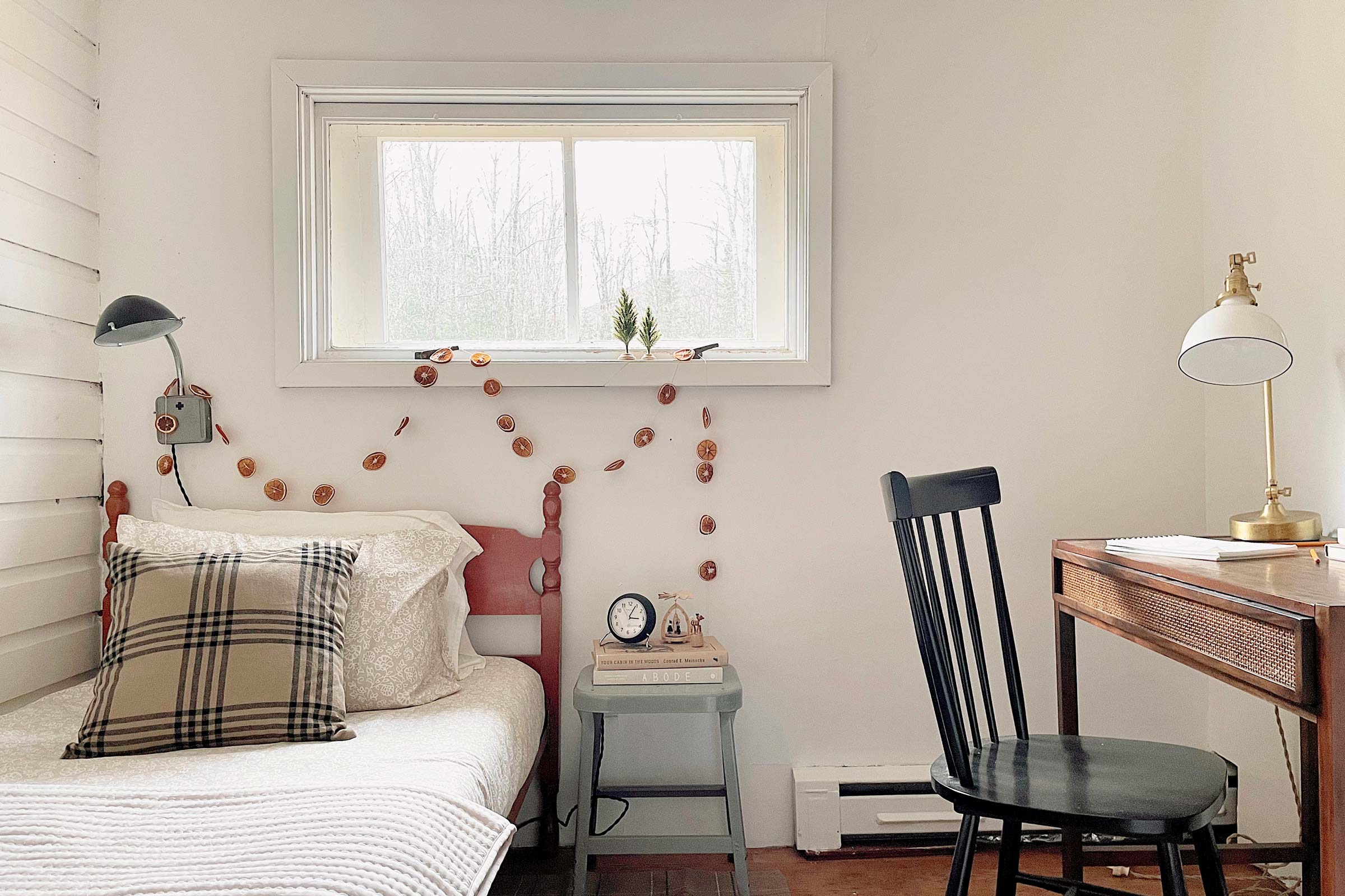 A kid's bedroom in a cozy cabin.