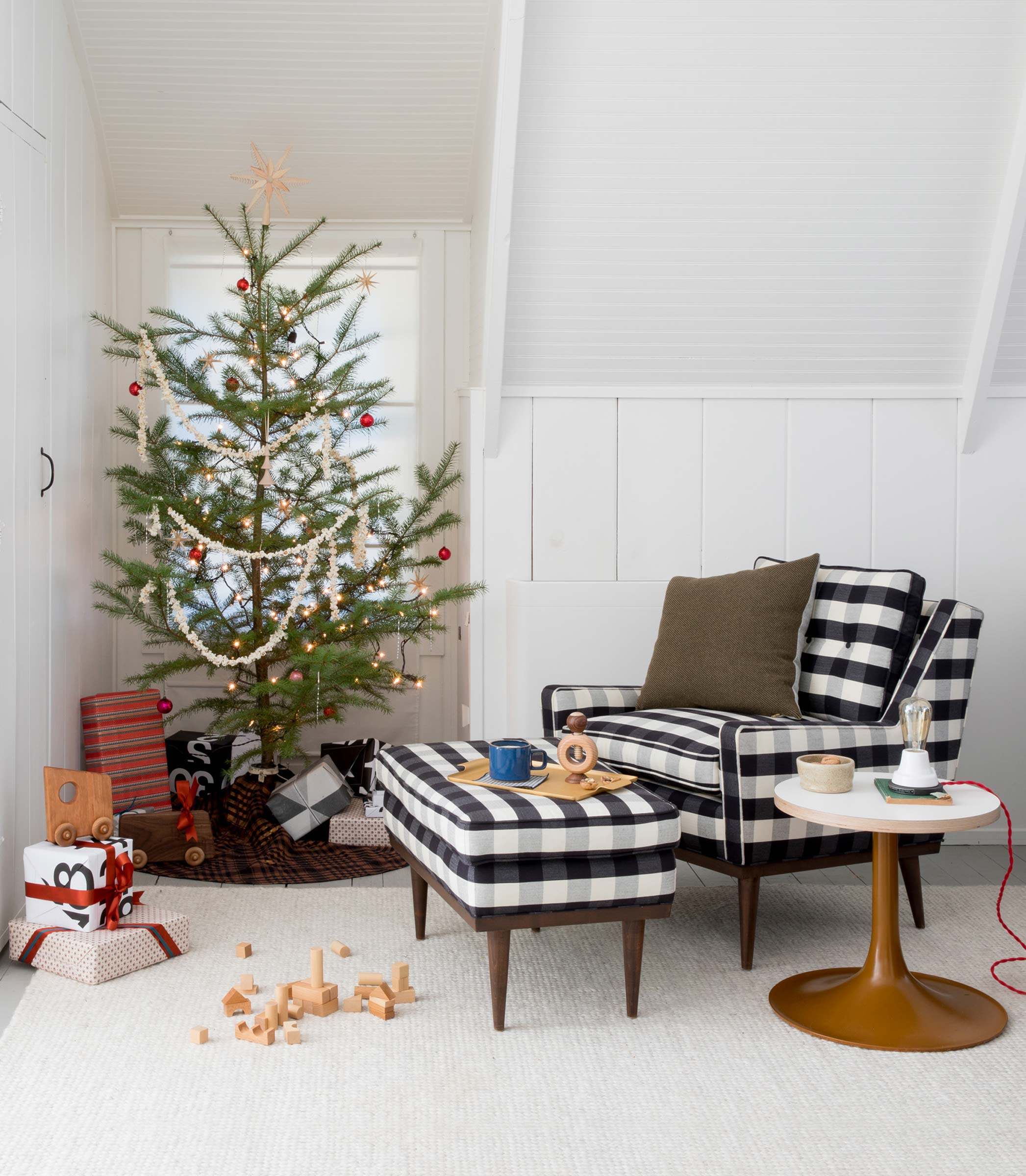 Cozy living room with a Christmas tree.