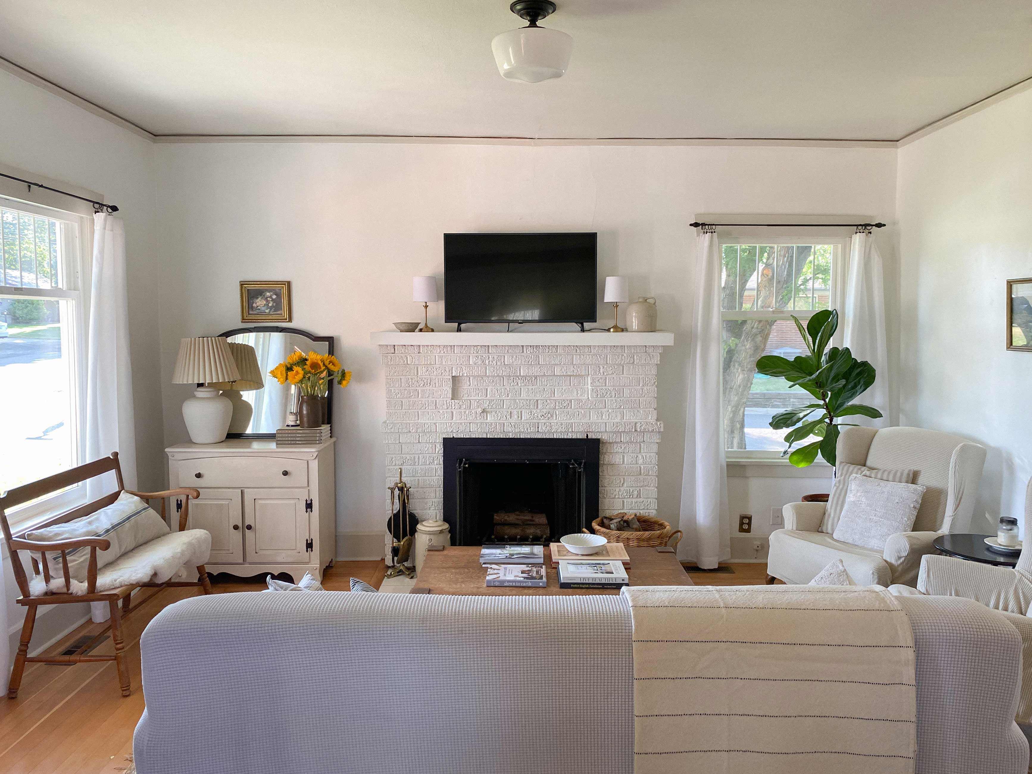 Open living room with fireplace and couch