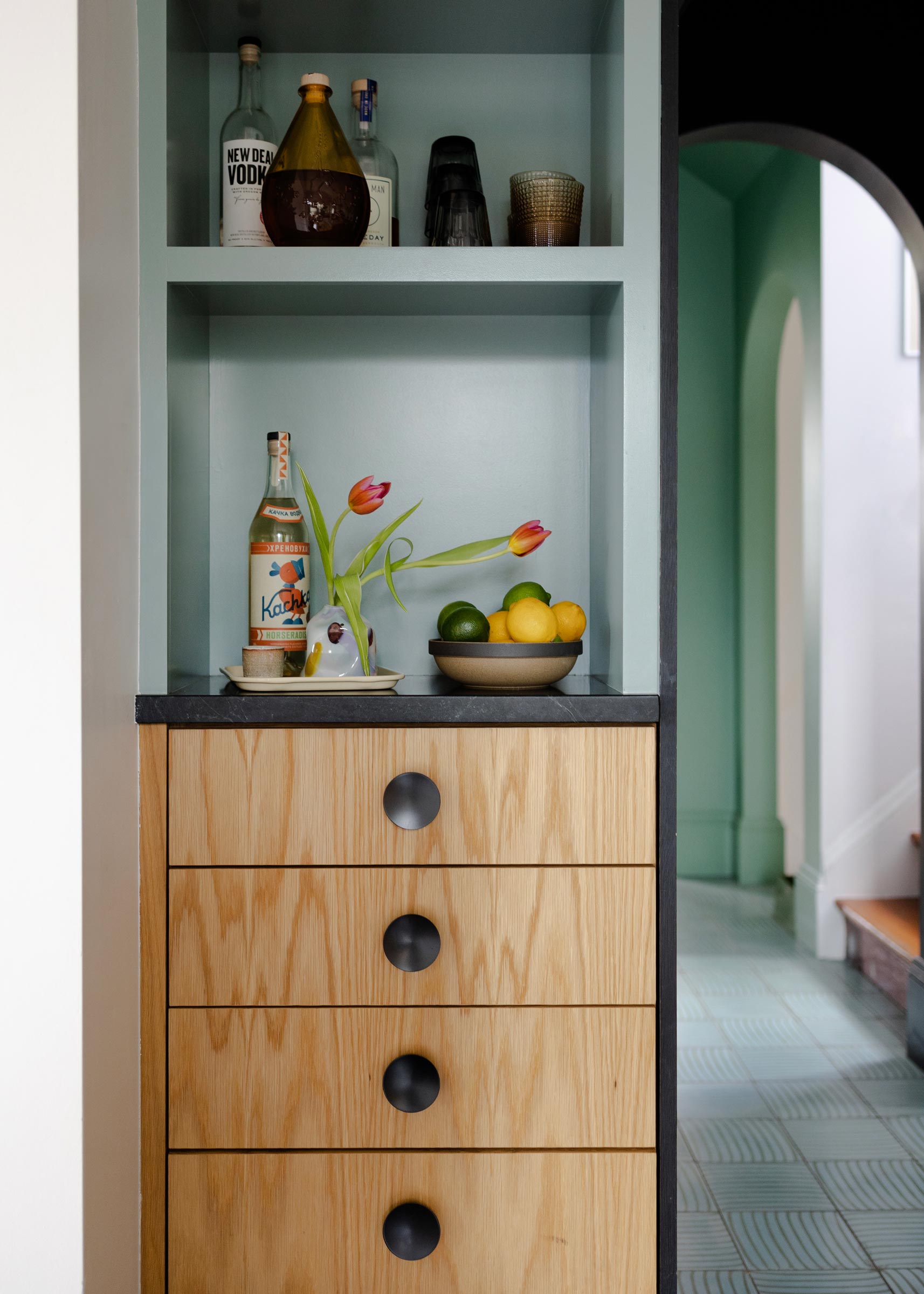 Mid century cabinet hardware in a modern kitchen. 