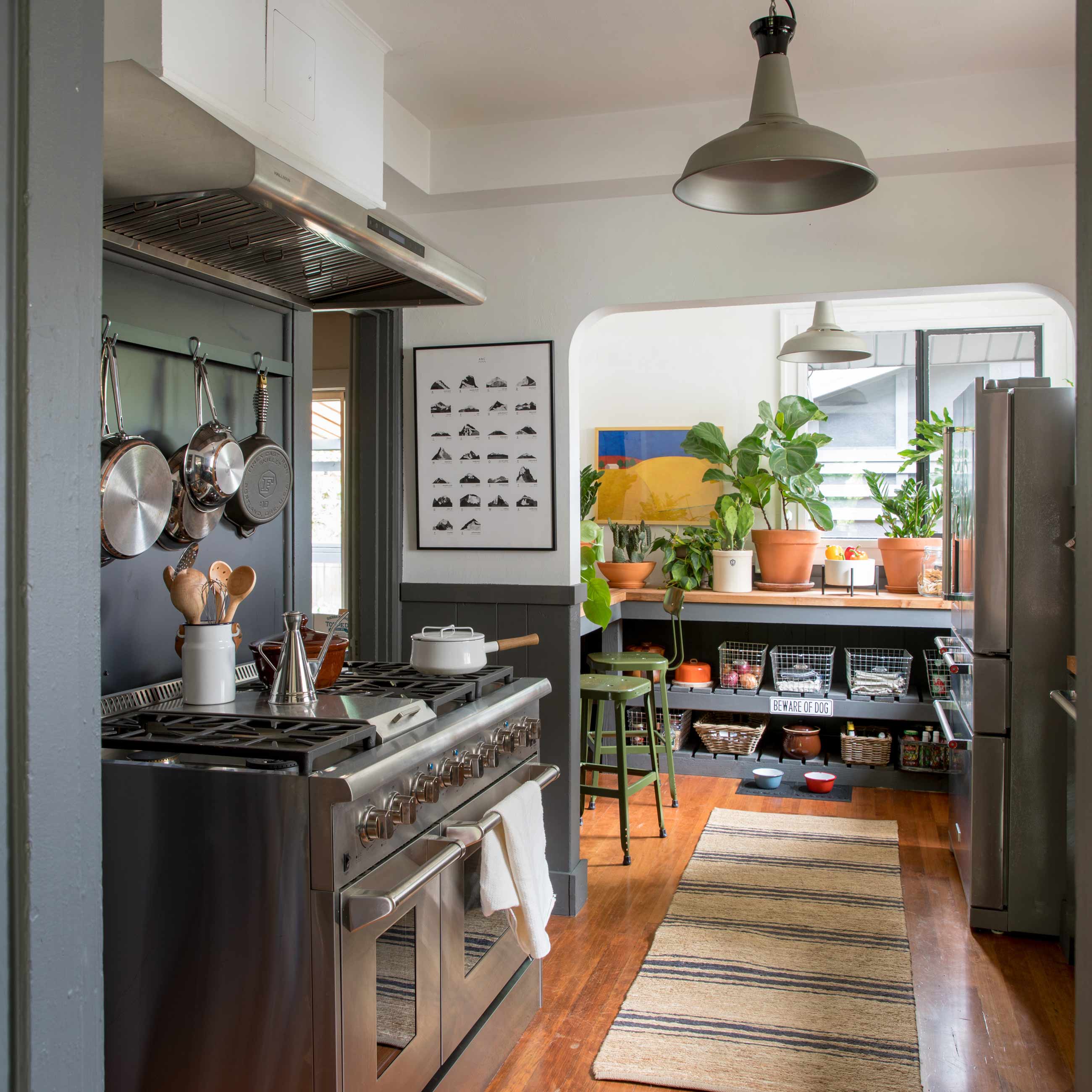 Modern industrial style kitchen with dark accents.