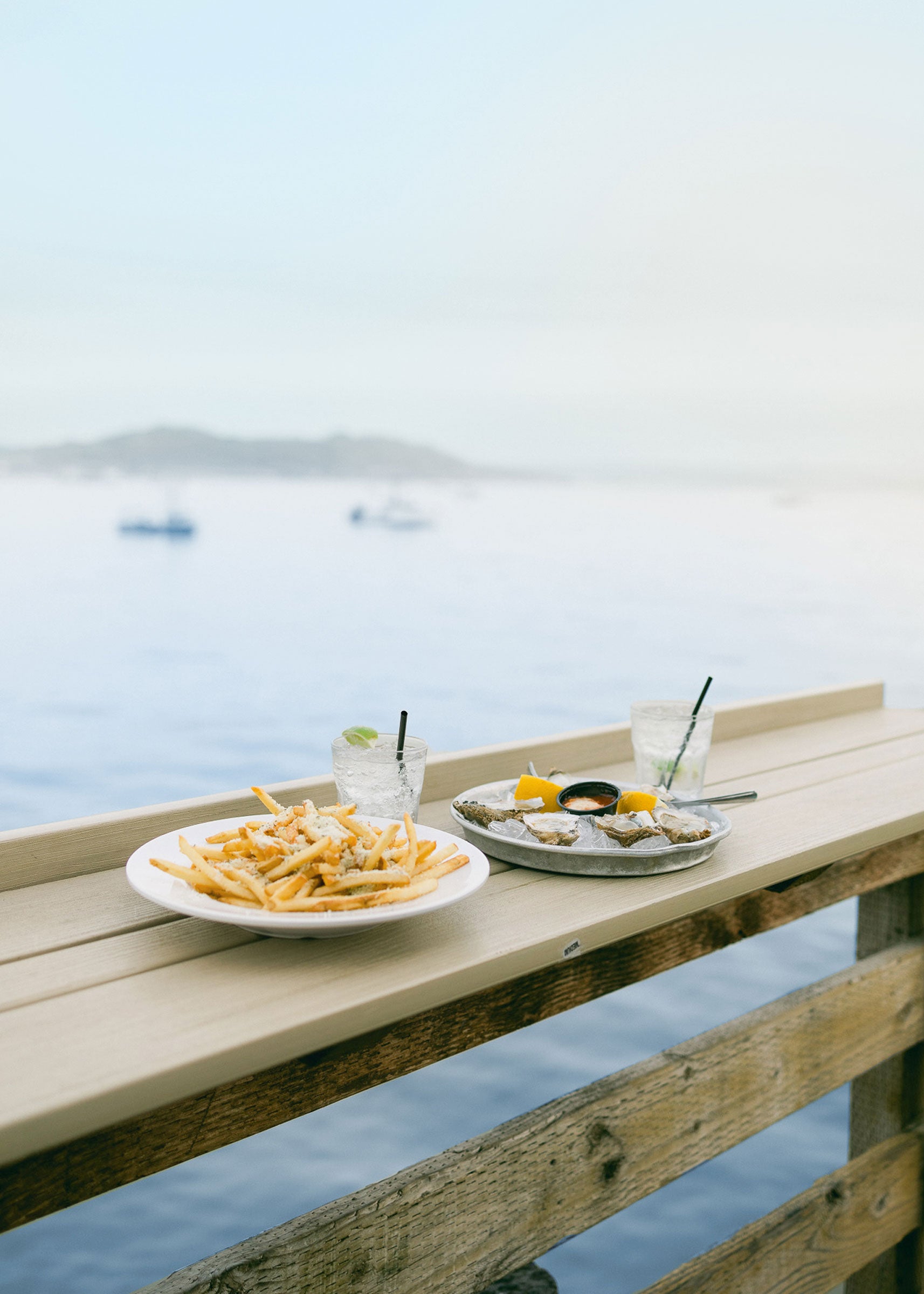 Eating oysters and french fries on the California coast. 