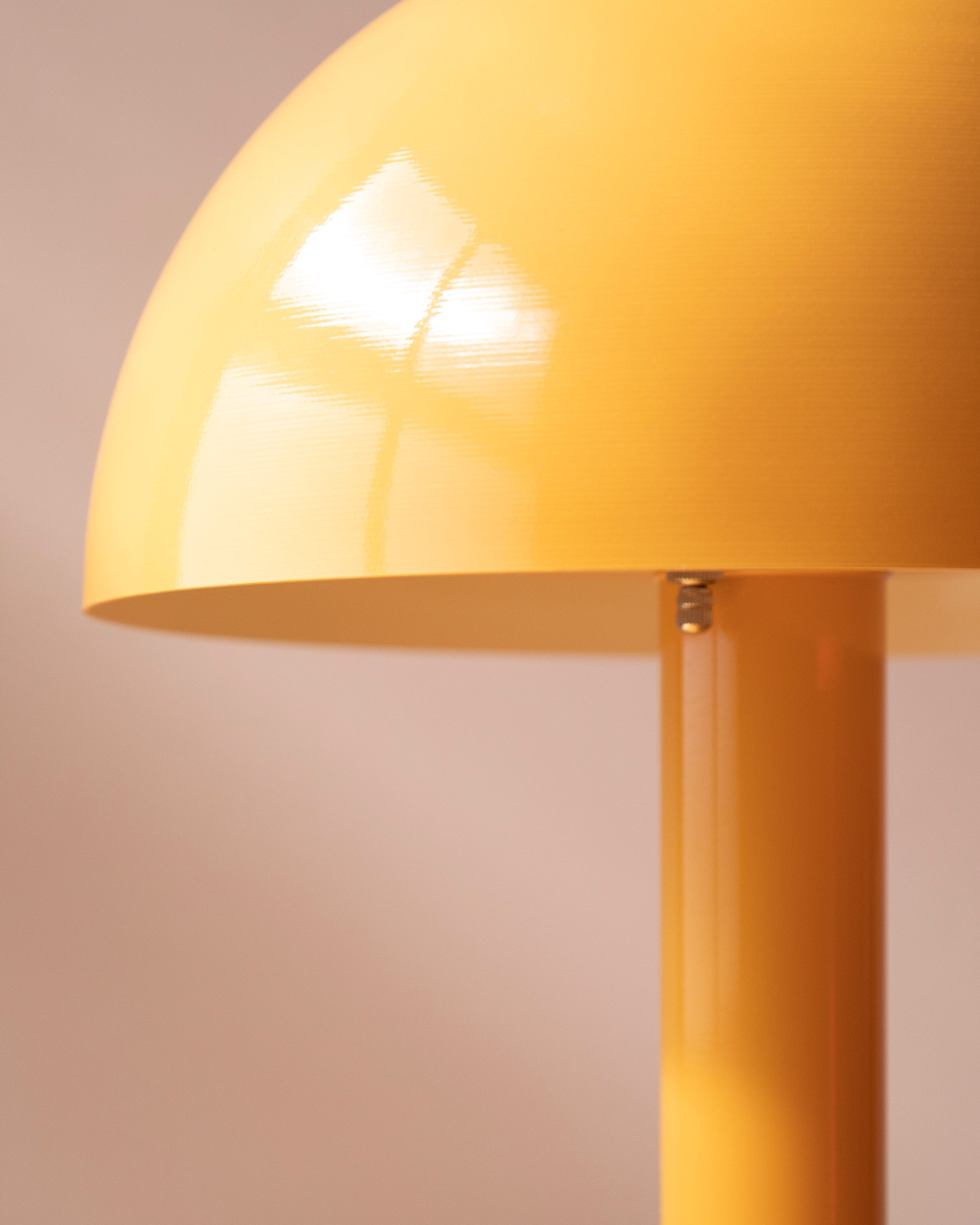 The Sidnie Table Lamp in a Chamomile gloss finish.