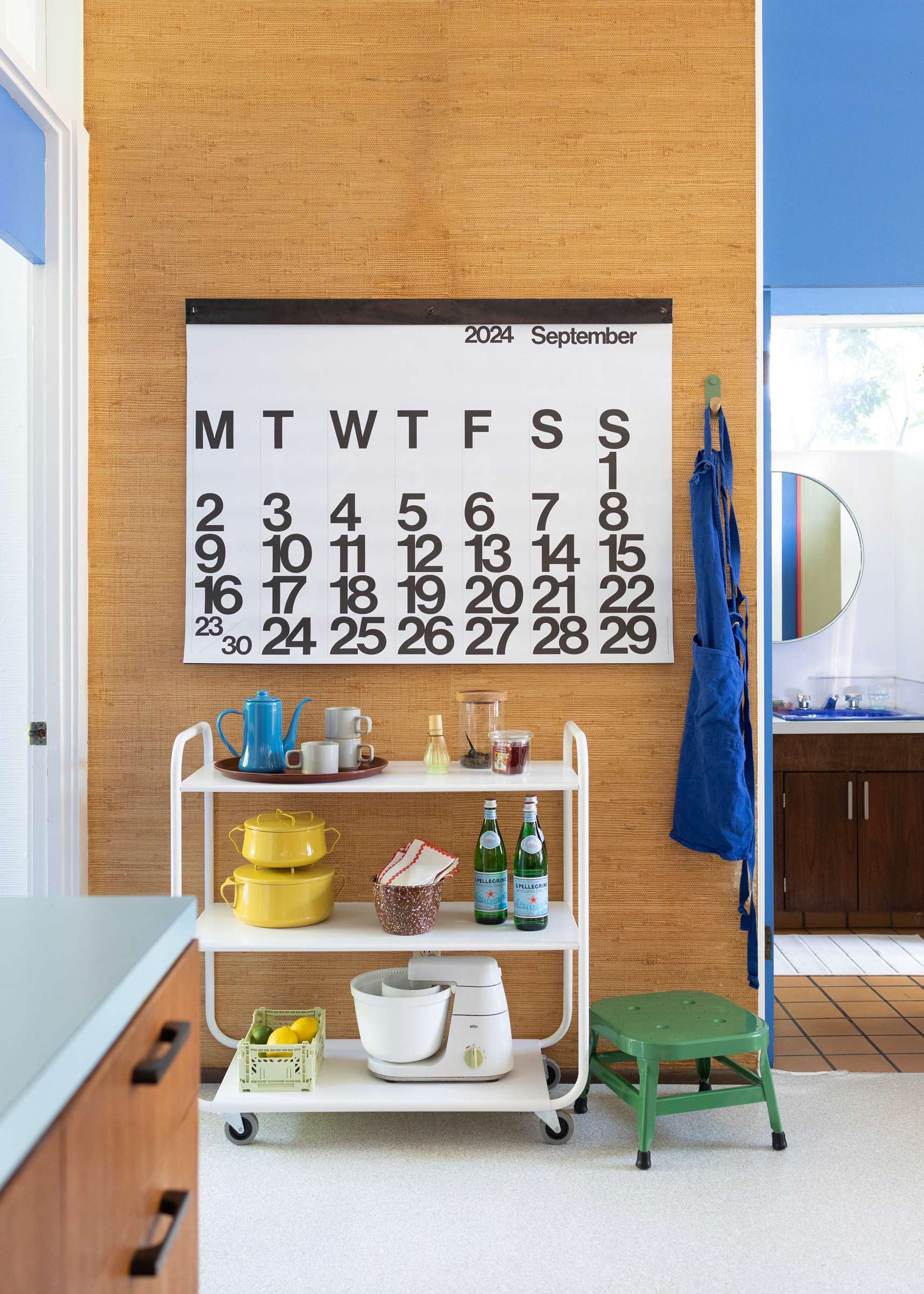 A stendig calendar in the kitchen.