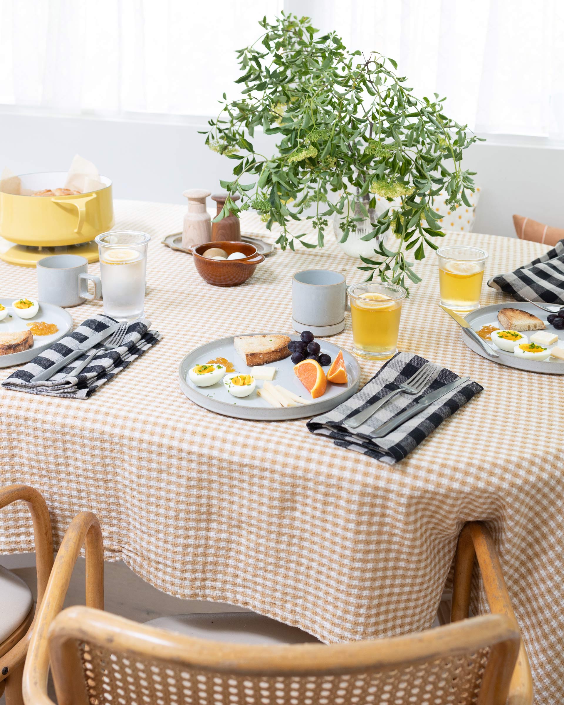 Summer table with plaid linen napkins and Hasami Dinnerware. 