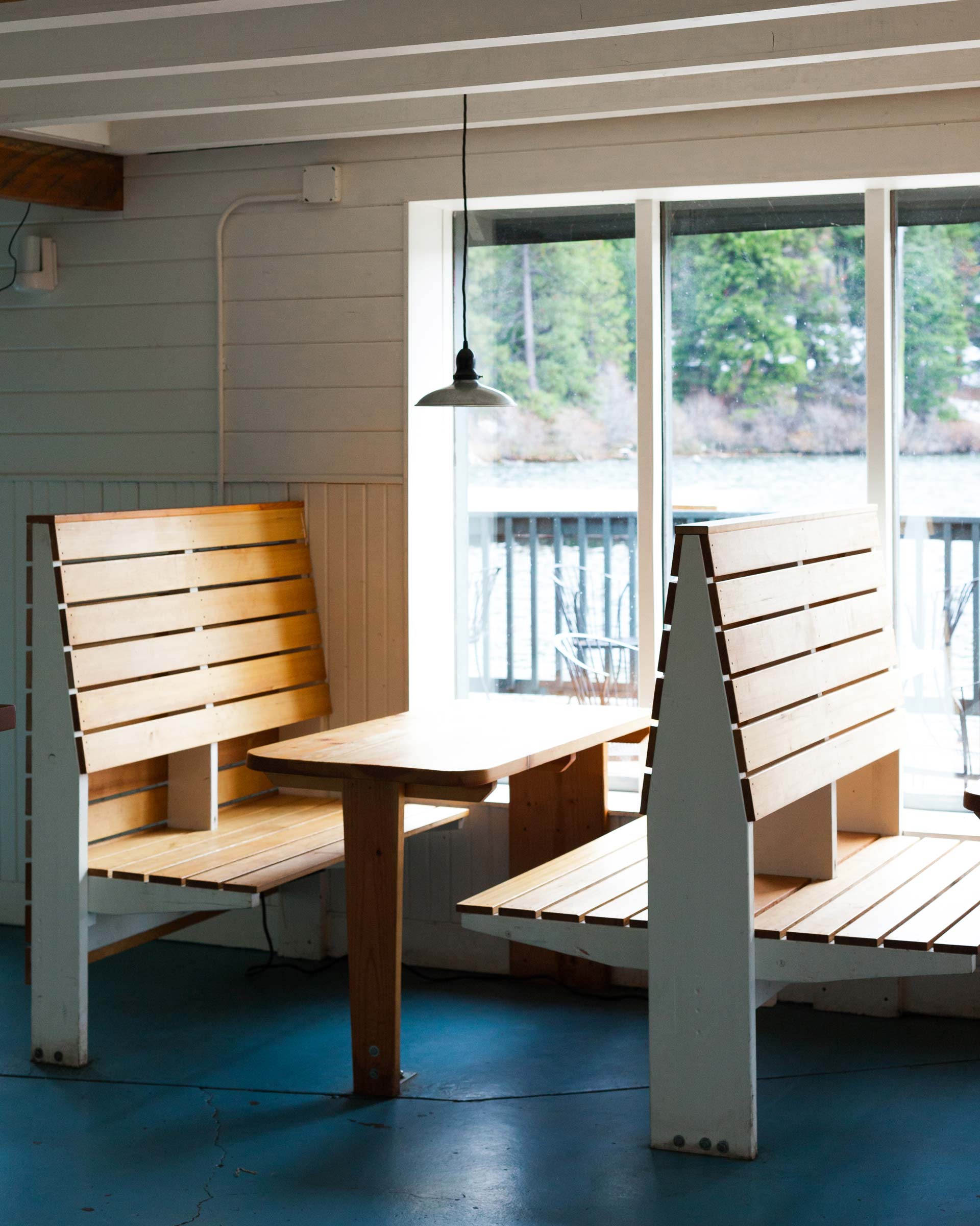 Suttle Lodge boathouse with a pendant over a dining table. 