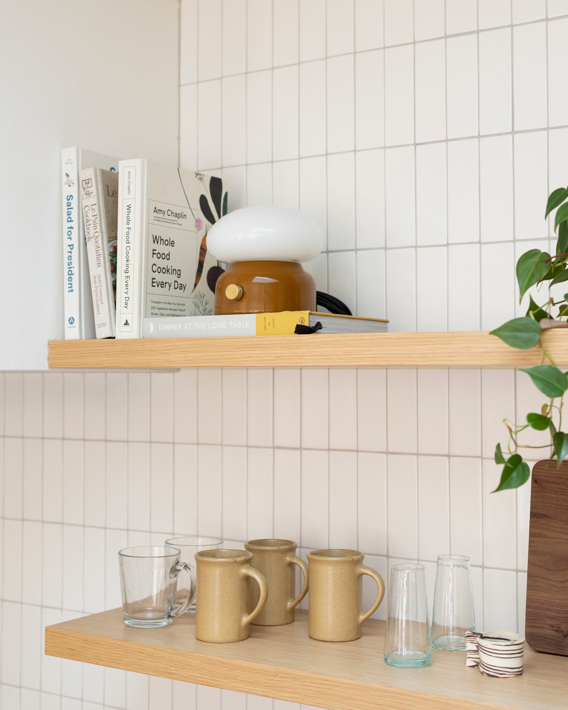 The Teig Lamp on a kitchen shelf.