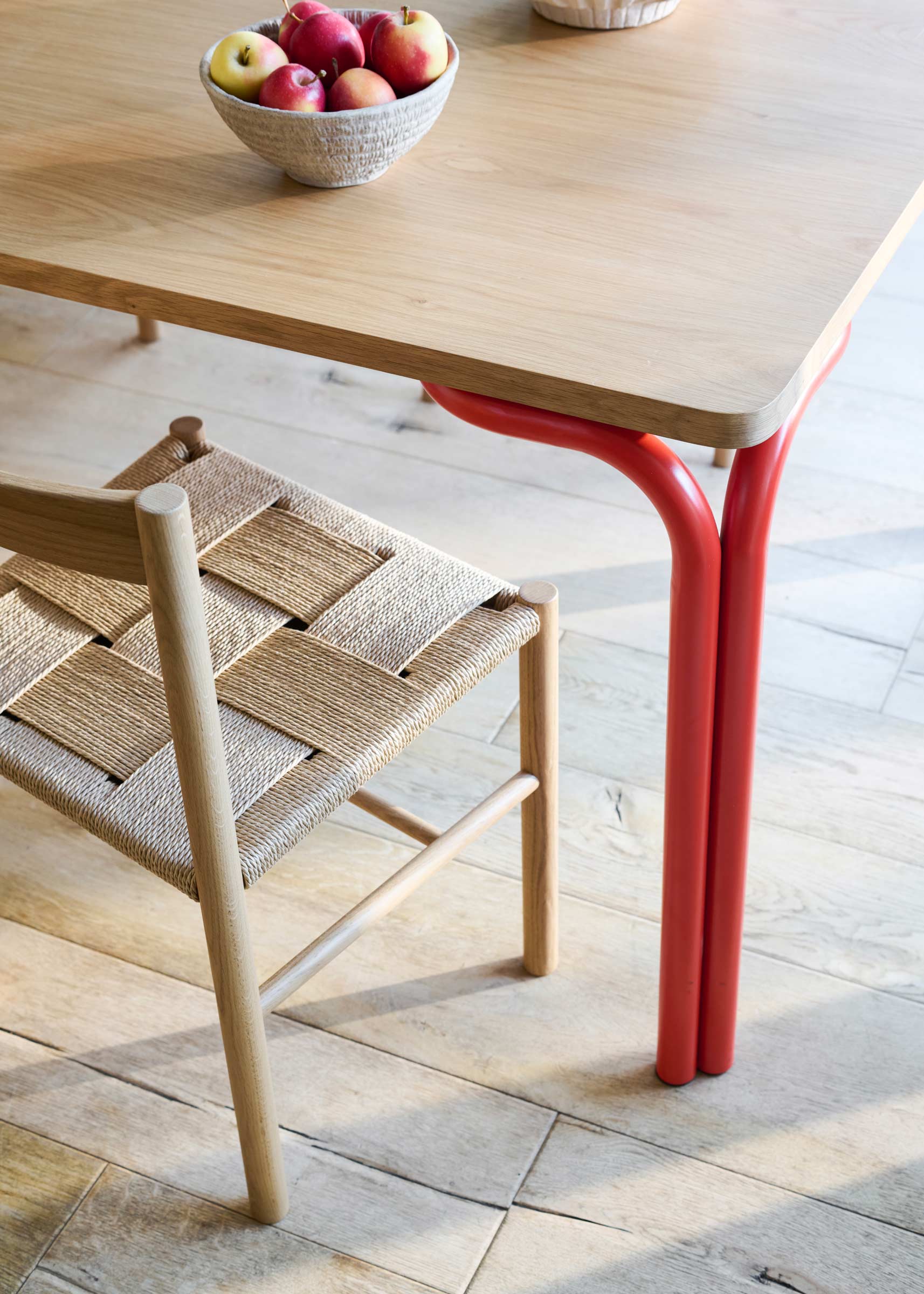 Textured bentwood chairs in a dining room.