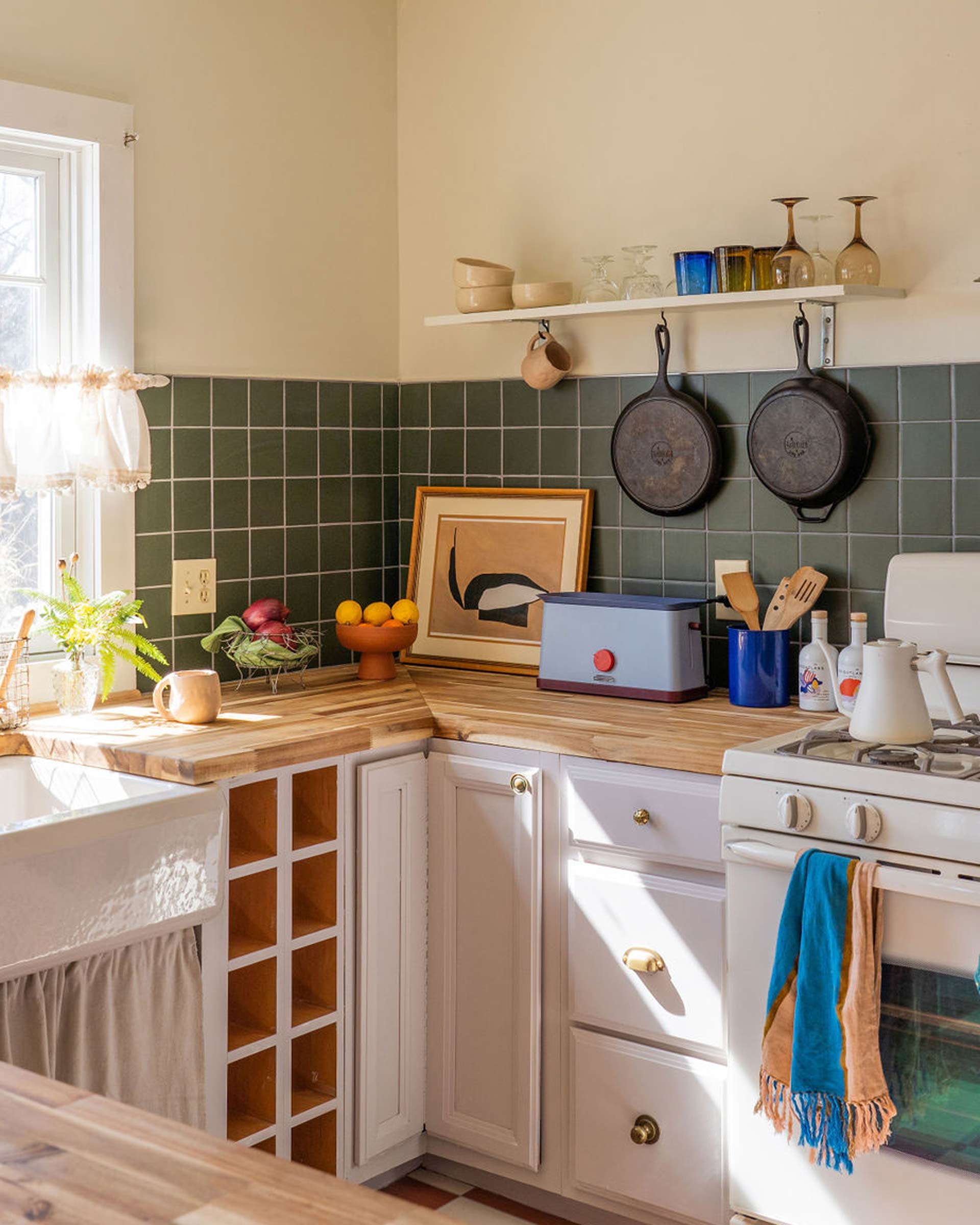 A kitchen corner with various cabinet hardware. 