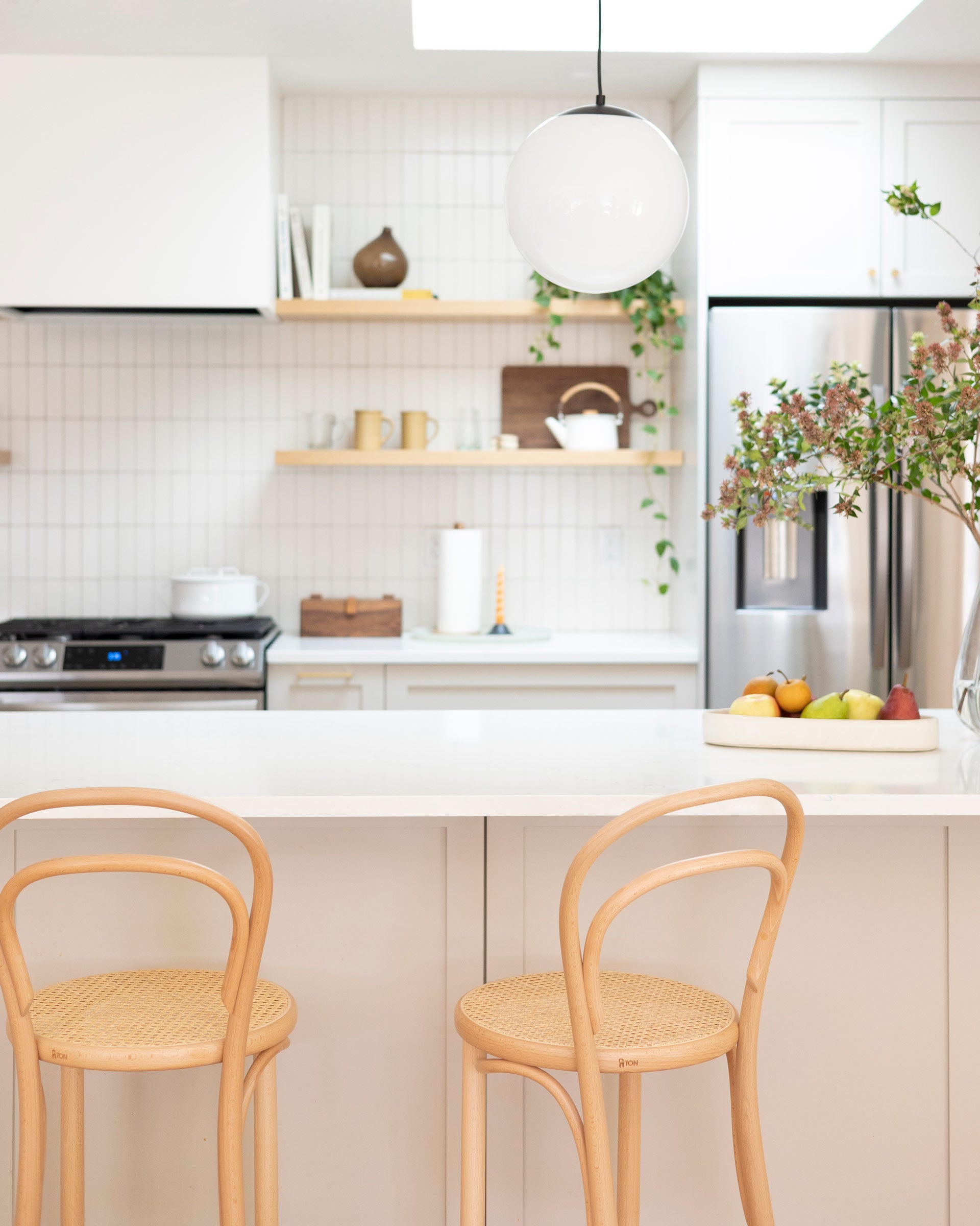 TON bentwood caned chairs in a modern kitchen island