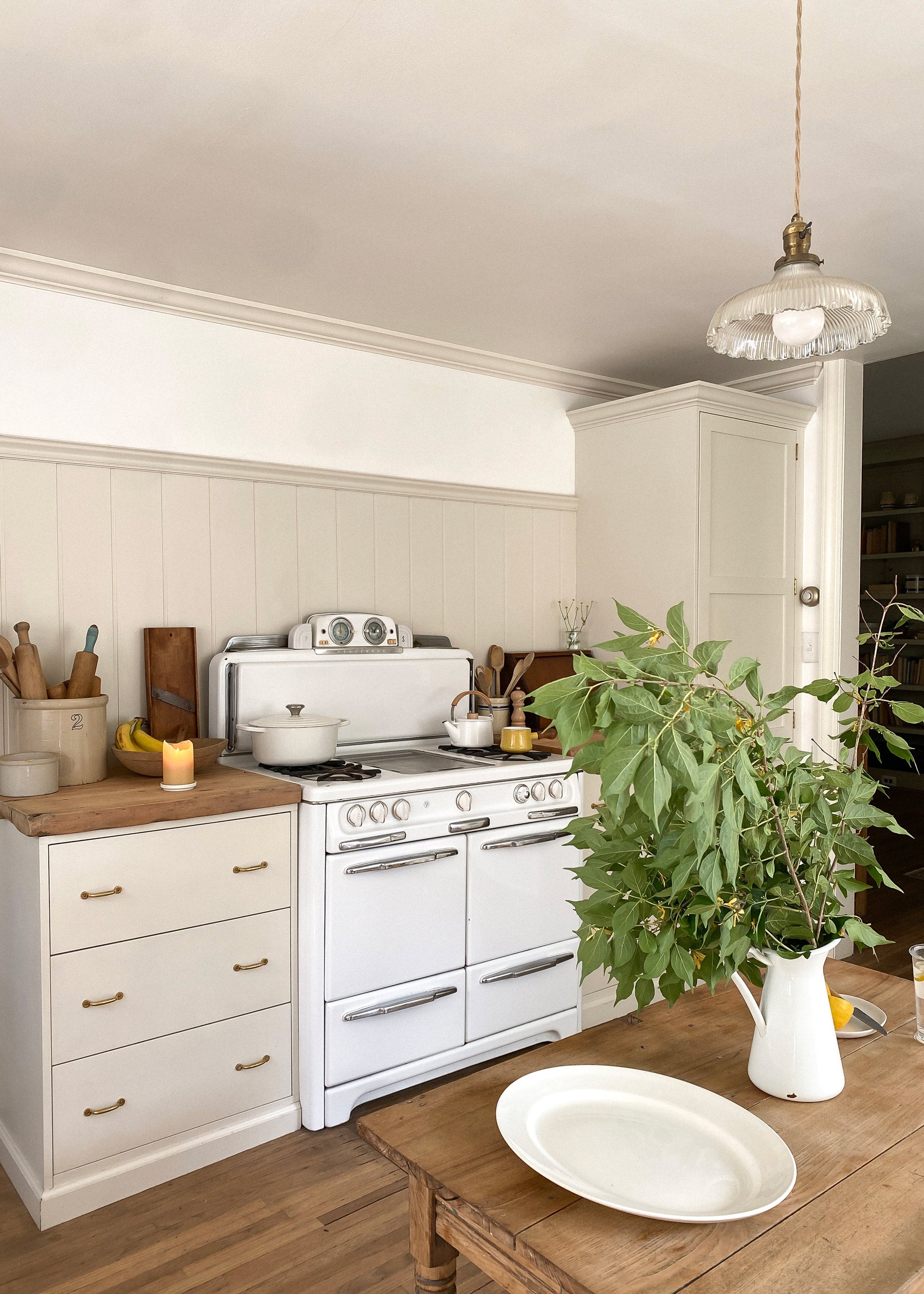 White kitchen in a traditional style home. 