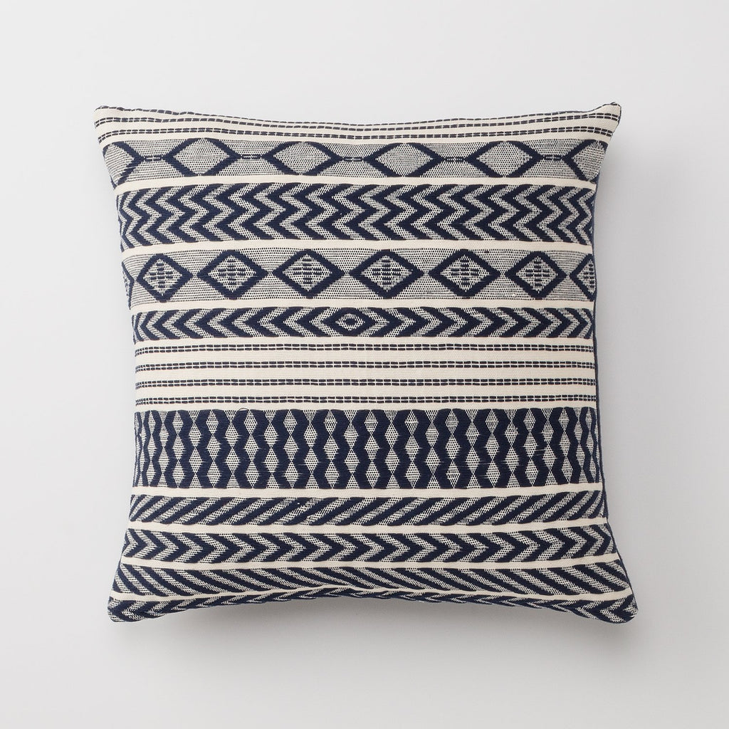 navy and beige pillows