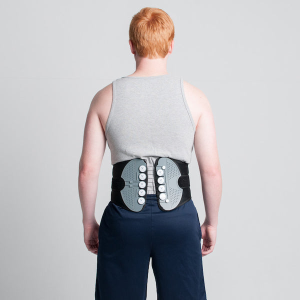 man in Vertebral Brace - back view