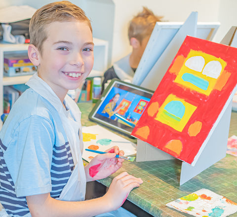 Child Painting A Robot