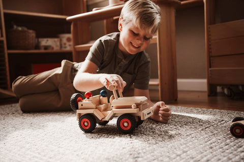 boy with fagus jeep