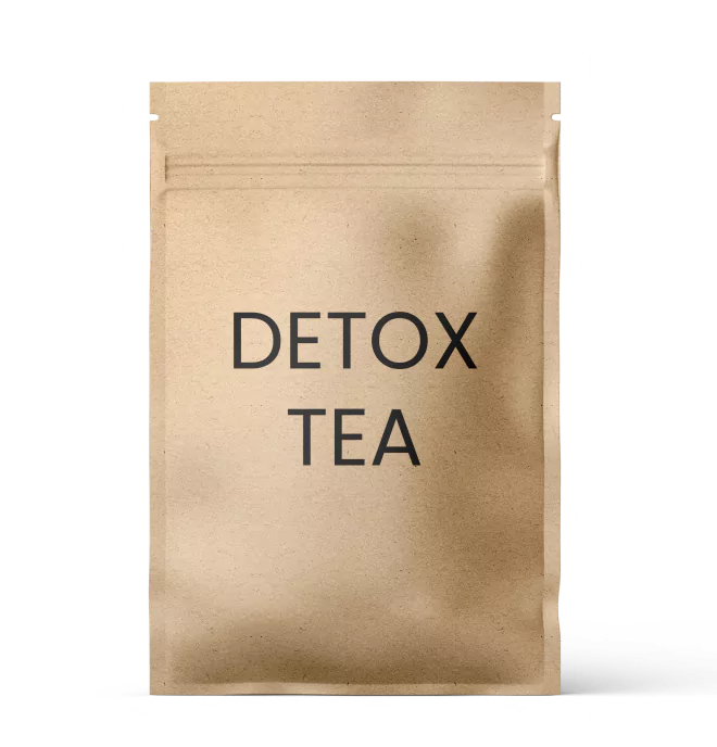 A sealed brown paper pouch labeled 'DETOX TEA' on a transparent background.