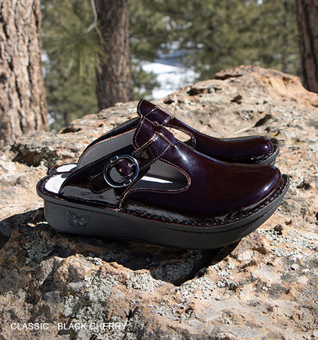 Classic black cherry clog, recognized as APMA accepted styles for promoting good foot health.