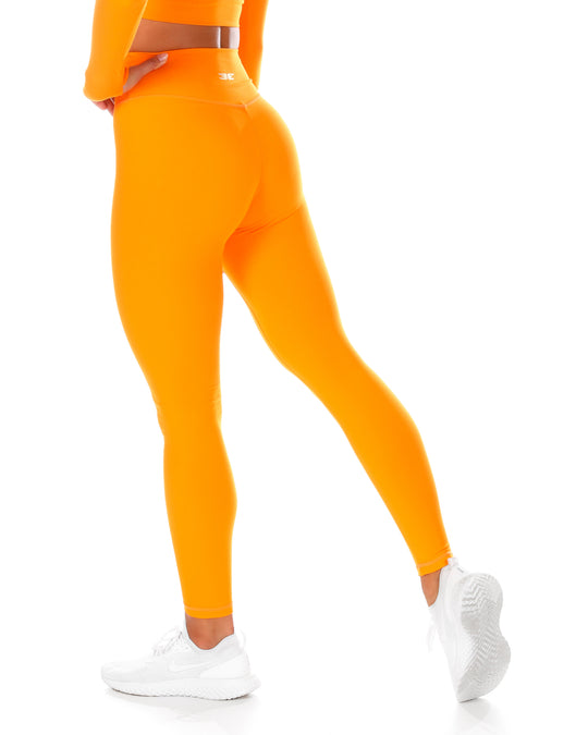 aerie crossover flare leggings orange｜TikTok Search