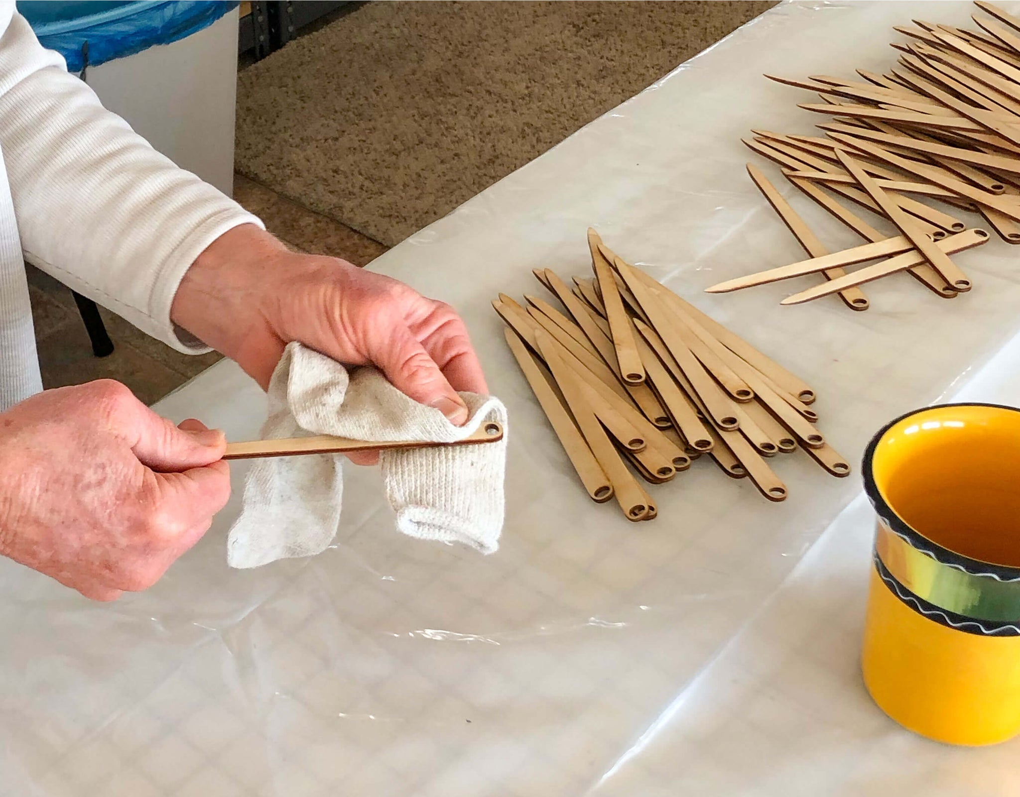 waxing the wooden needles