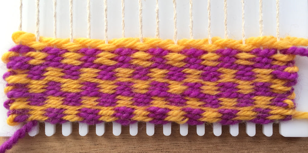 Checkered pattern woven on a little loom